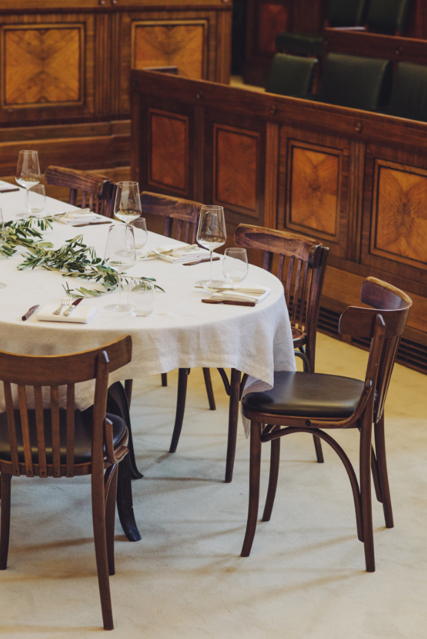 Elegant dining table in Town Hall Hotel's Council Chamber for corporate dinners and gatherings.