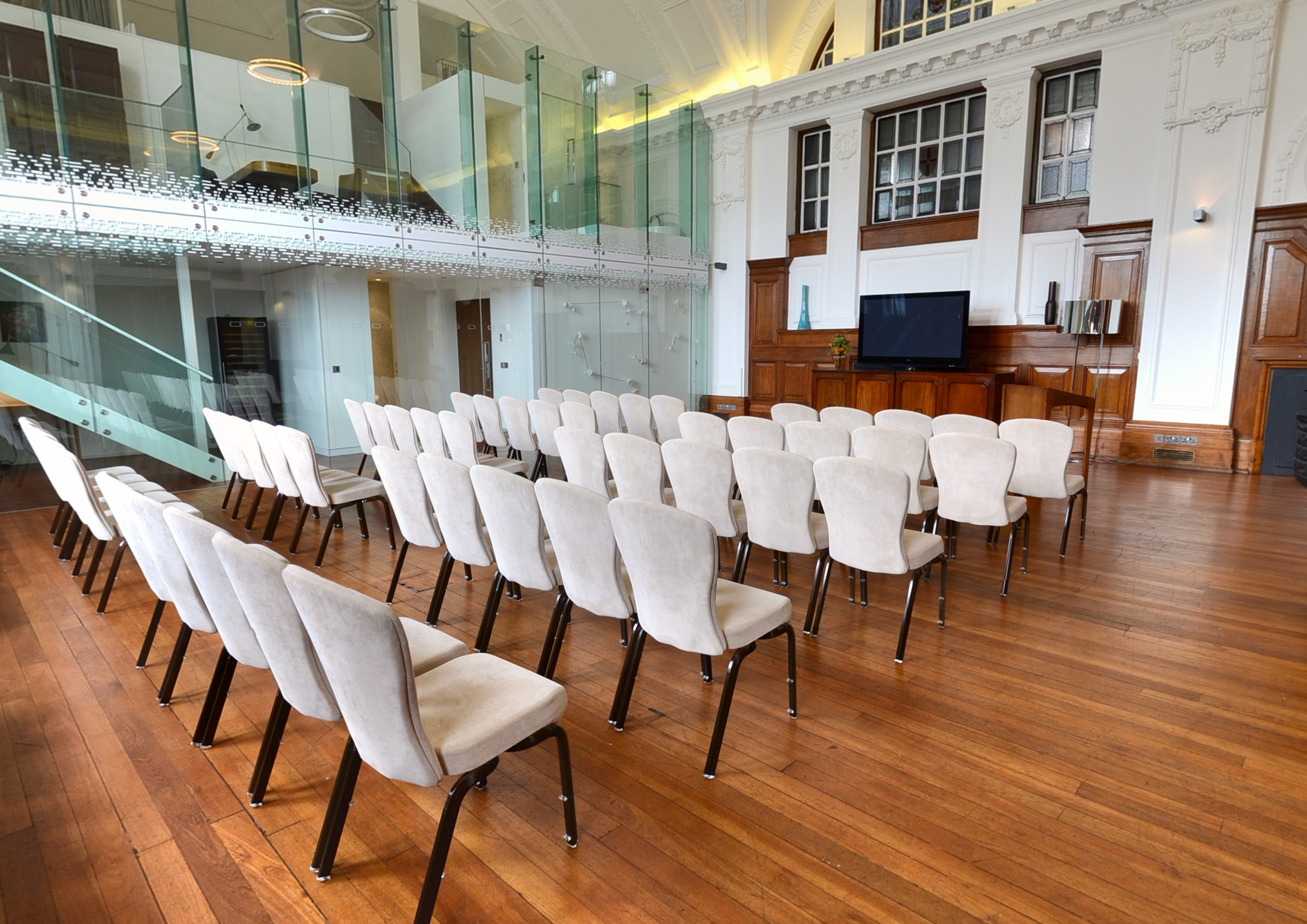 De Montfort Suite meeting space with elegant chairs, ideal for presentations and workshops.