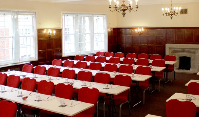 Oxford Suite meeting room with red chairs, ideal for conferences and workshops.