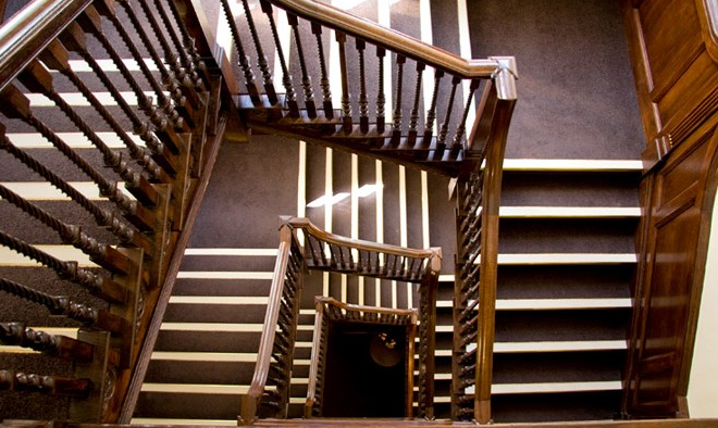 Elegant wooden staircase at Hallam Café, perfect for events and photo opportunities.