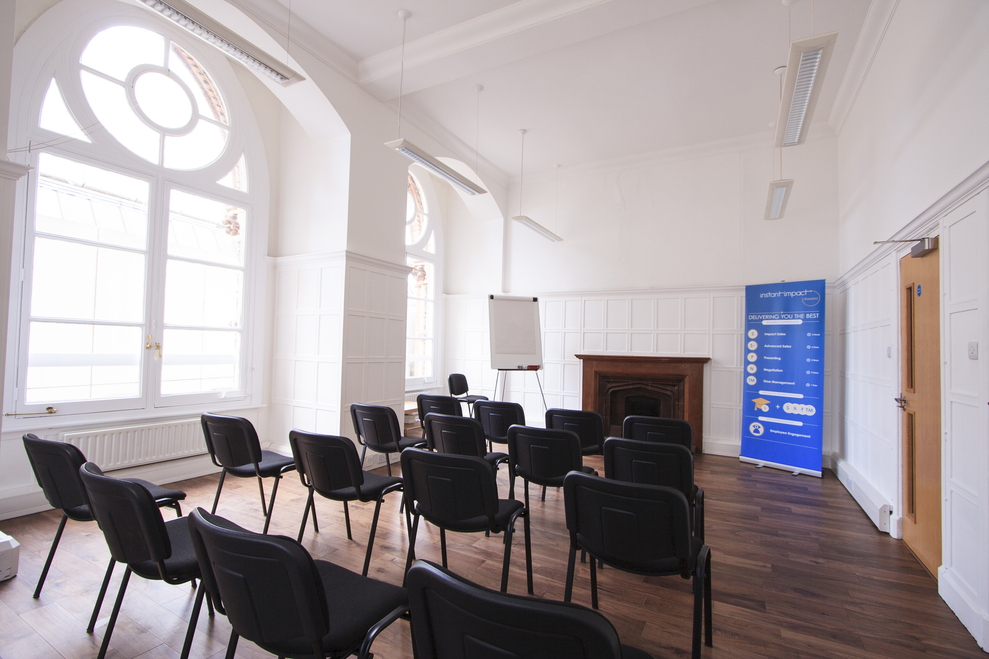 Westminster Room at Southbank Training, ideal for workshops with projector and chairs.
