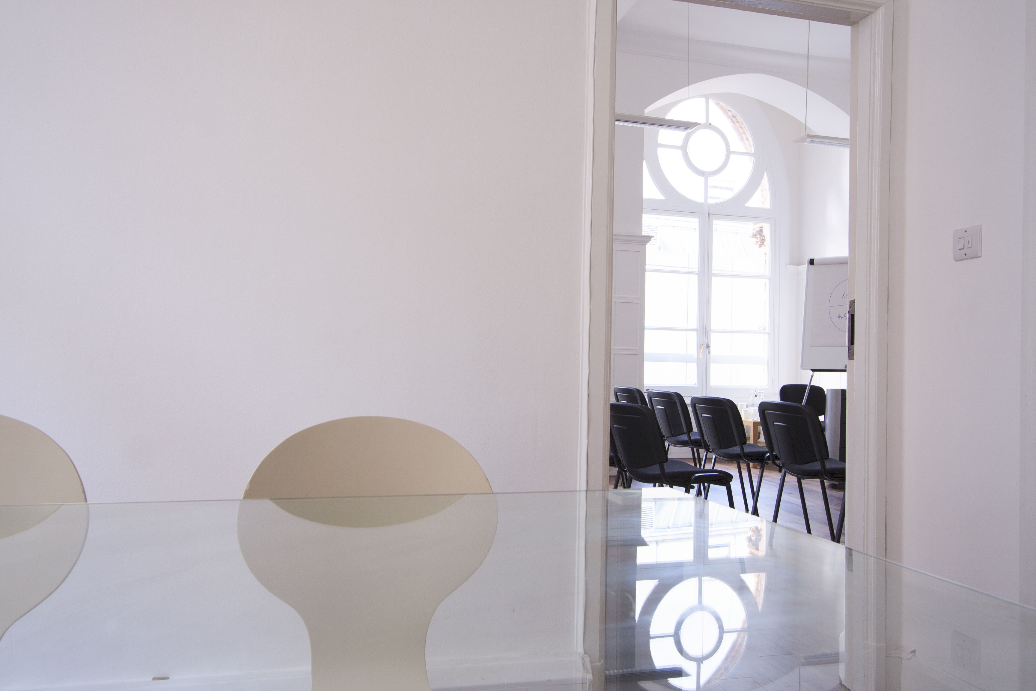 Waterloo Room at Southbank Training: sleek meeting space with glass table, ideal for workshops.