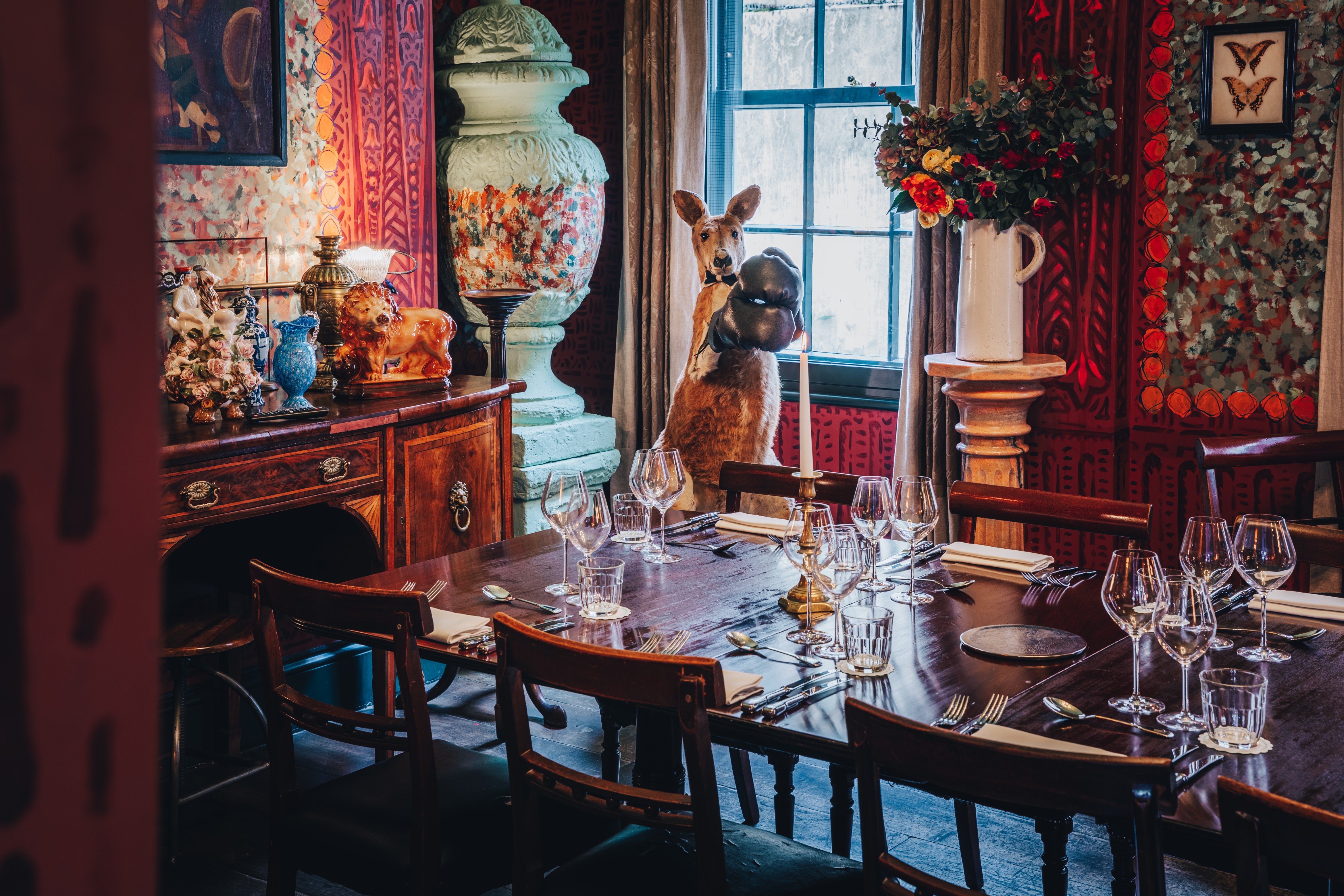Intimate dining room with eclectic decor and kangaroo for exclusive events in Clerkenwell.