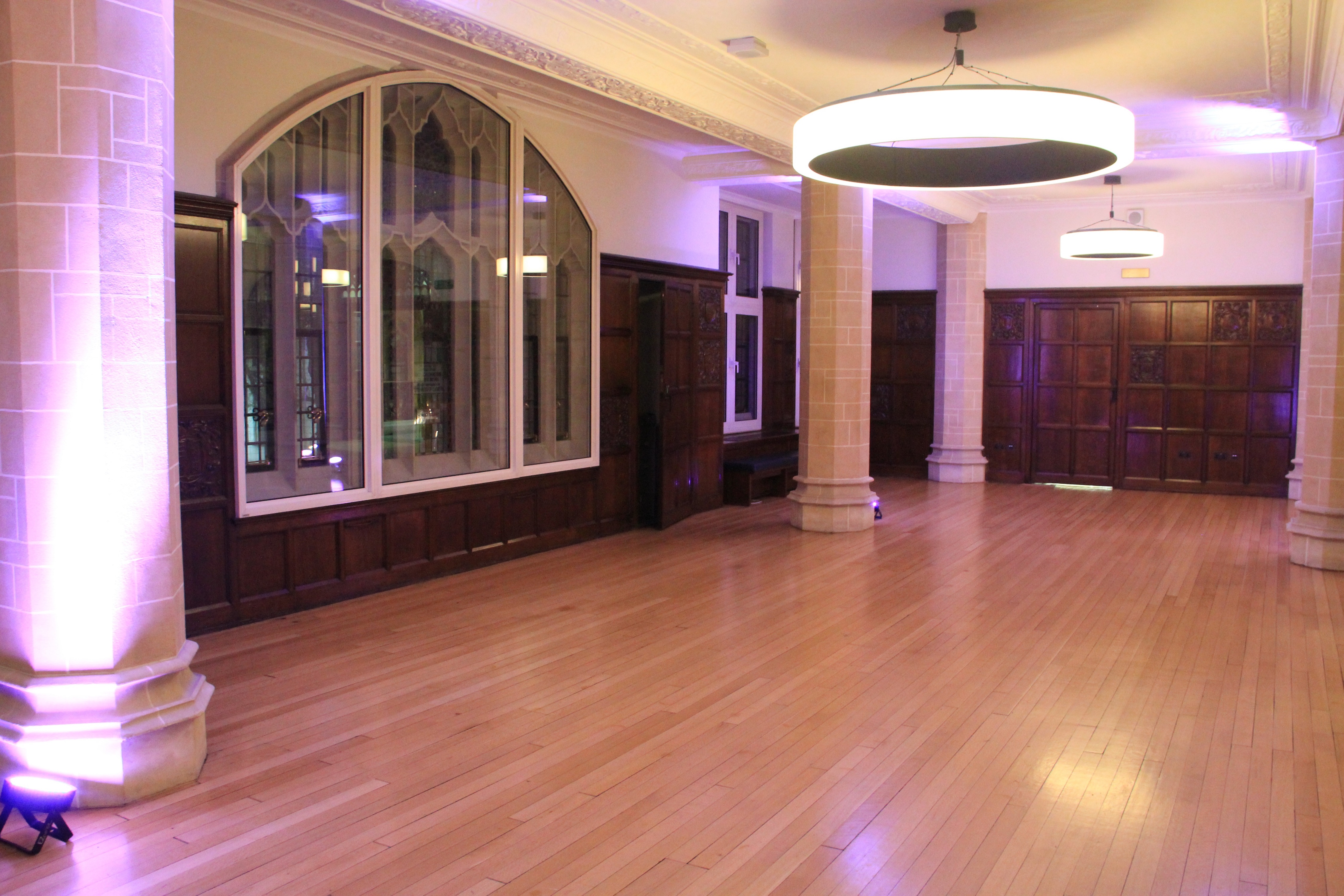 Elegant Supreme Court lobby with large windows, ideal for formal events and gatherings.