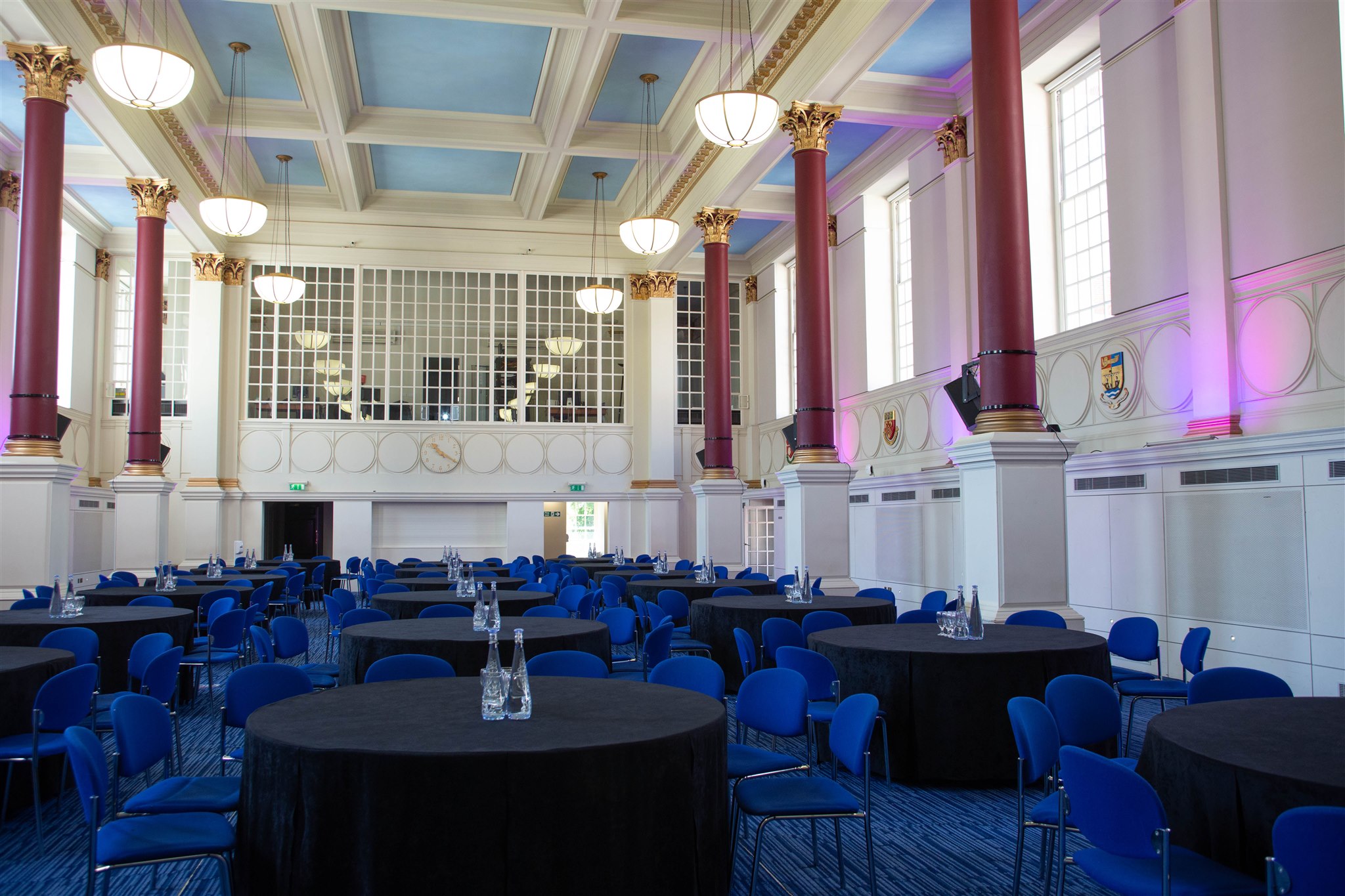 Great Hall in BMA House: elegant event venue with round tables, ideal for conferences.