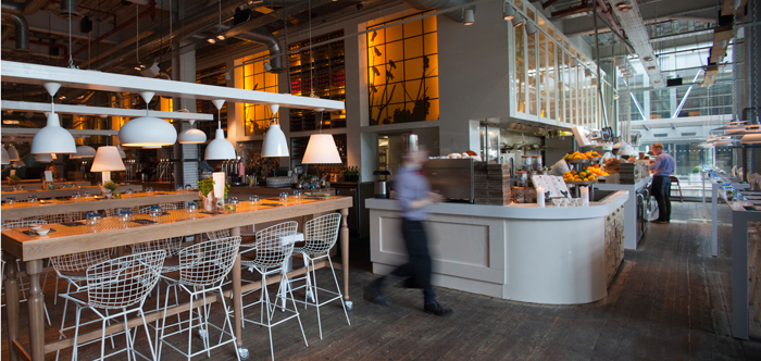 Modern event venue with sleek bar, ideal for gatherings and receptions.