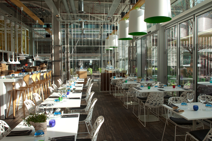 Modern restaurant venue with stylish seating, ideal for networking events and meetings.