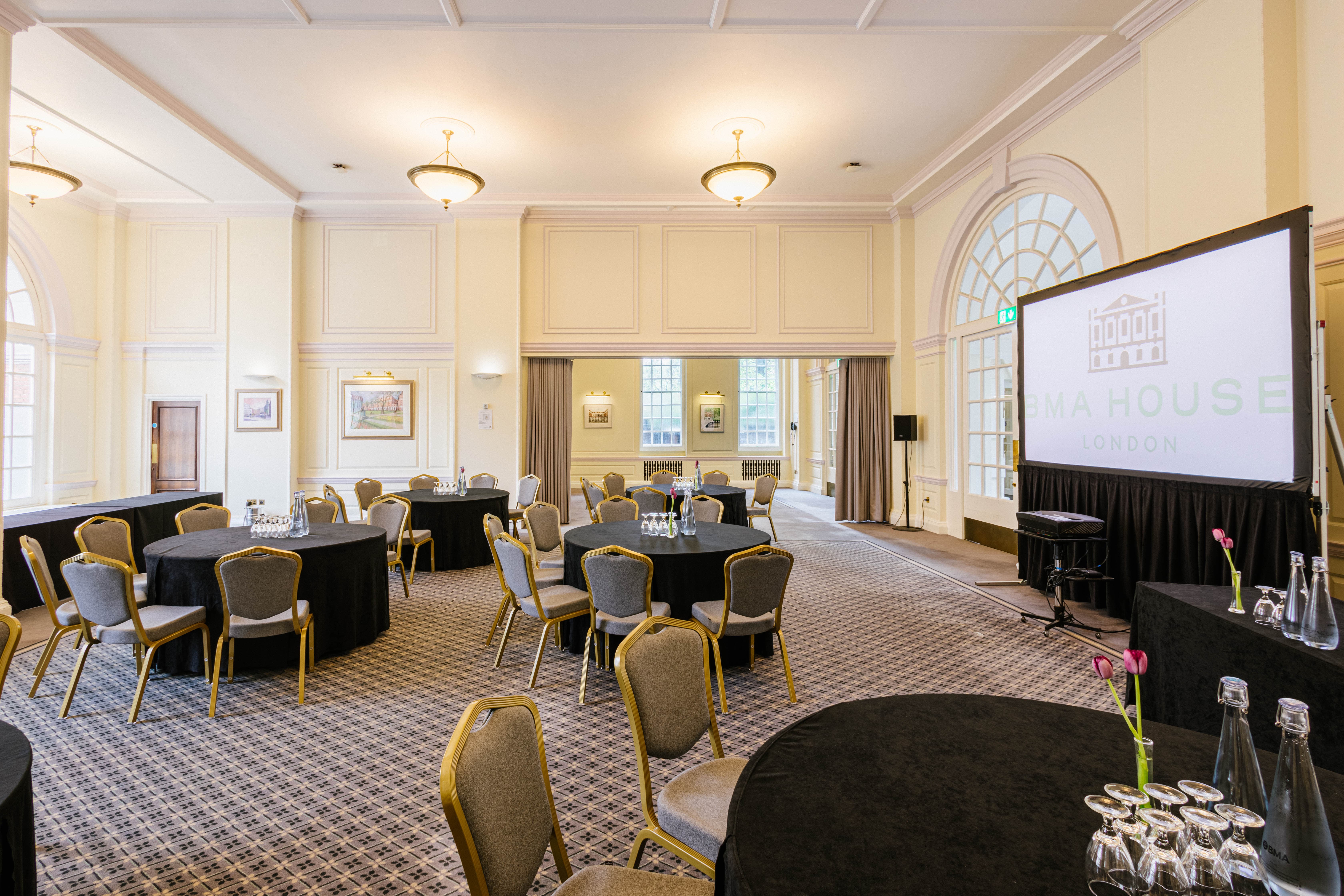Snow Room at BMA House featuring cabaret-style seating for corporate workshops and seminars.
