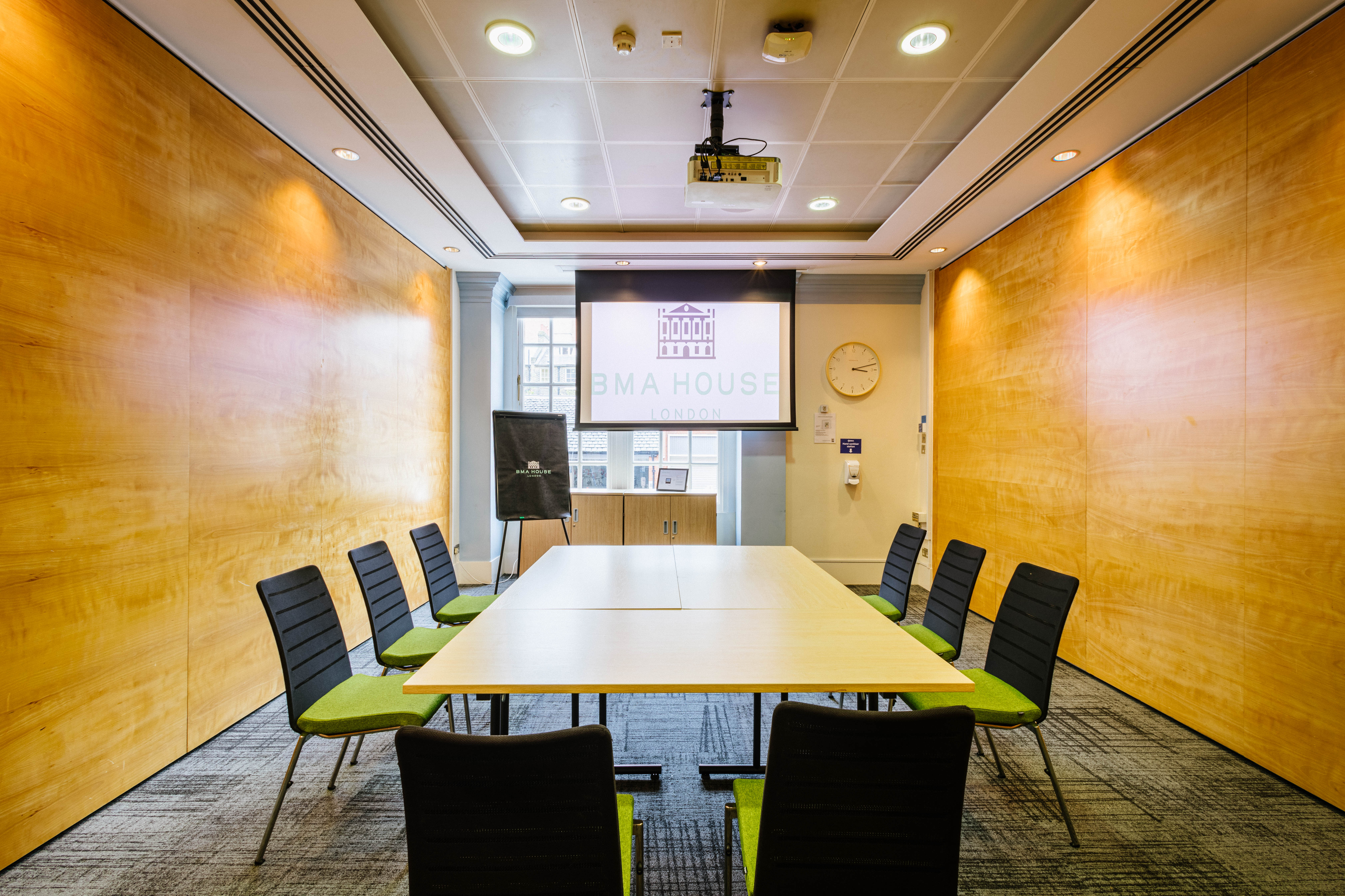 Modern meeting room in BMA House with ergonomic chairs, perfect for workshops and presentations.