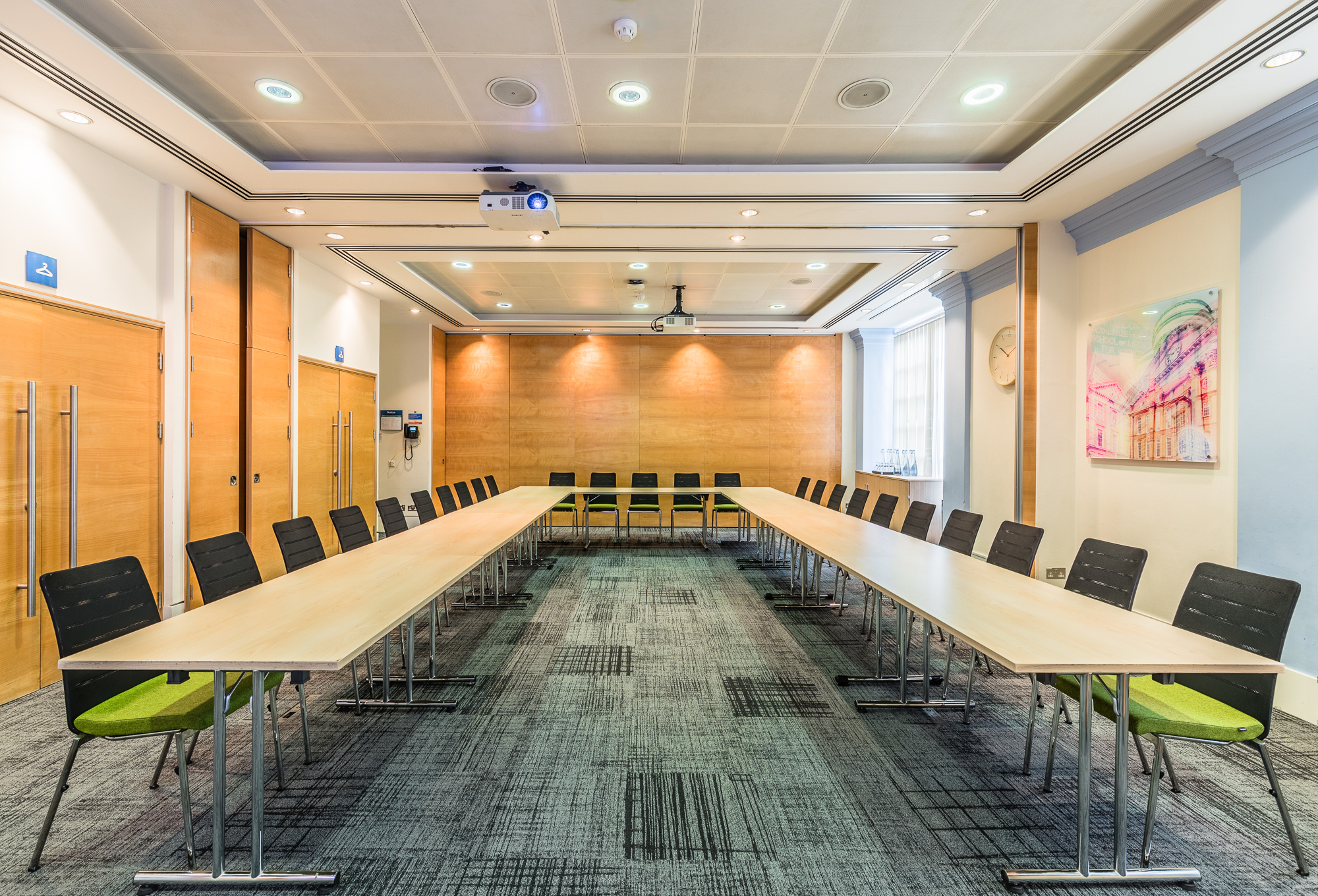 Anderson Barnes Suite meeting room with modern decor, ideal for workshops and presentations.
