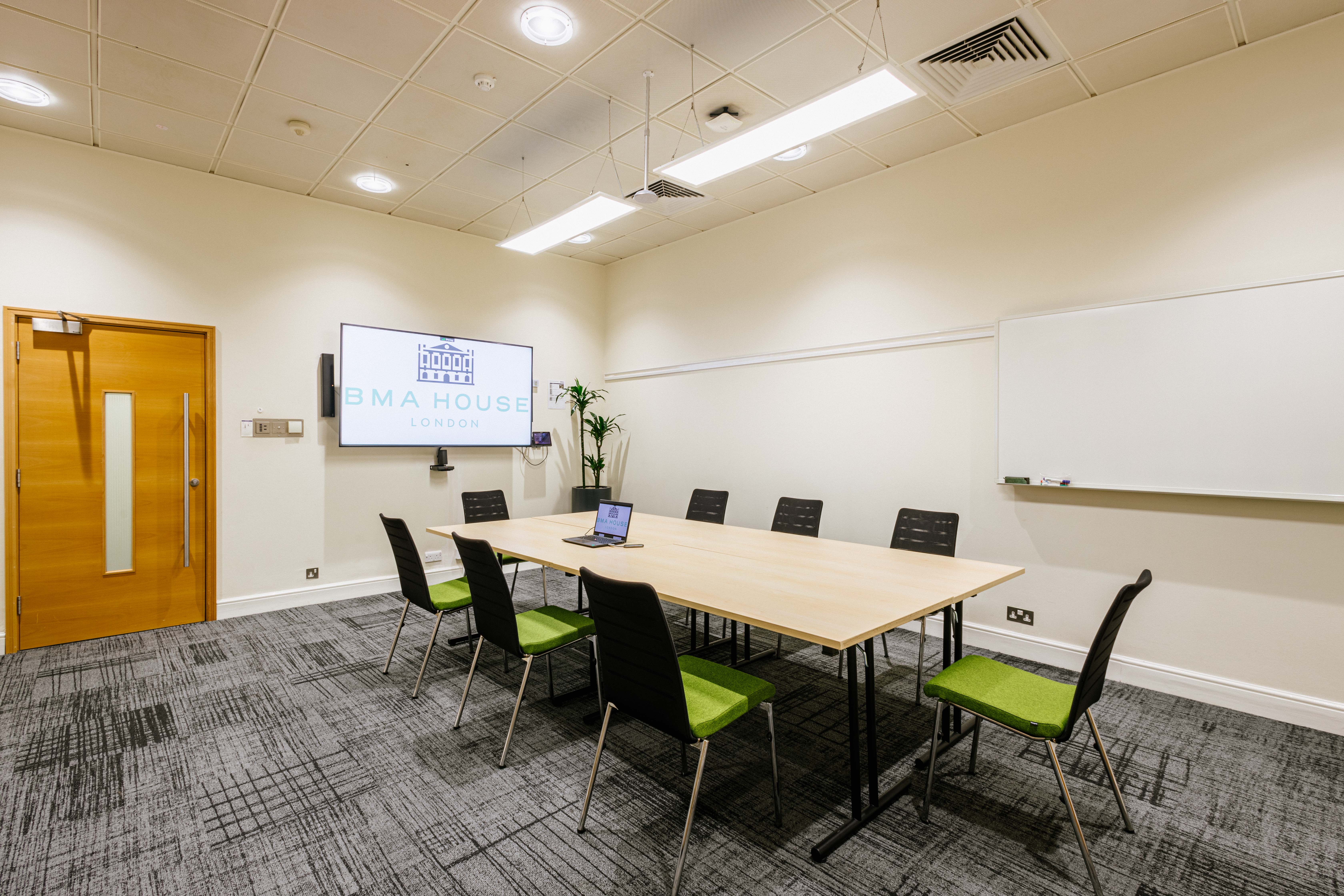 Modern meeting room in BMA House with ergonomic chairs, ideal for corporate workshops.