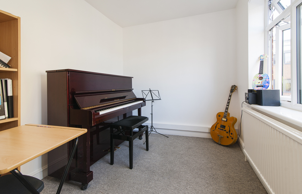 Small Music Rooms in artsHouse with piano, ideal for workshops and intimate gatherings.