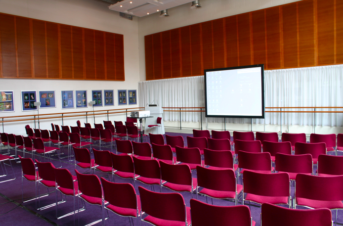 Birmingham Hippodrome Studio 5, featuring burgundy chairs for workshops and conferences.