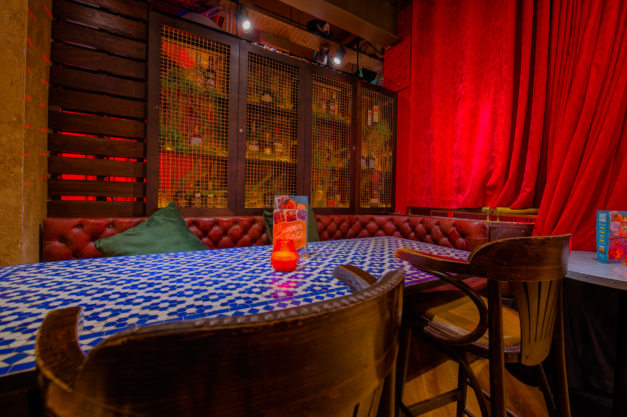 Havana Bar Manchester: vibrant meeting space with tiled table, ideal for creative events.