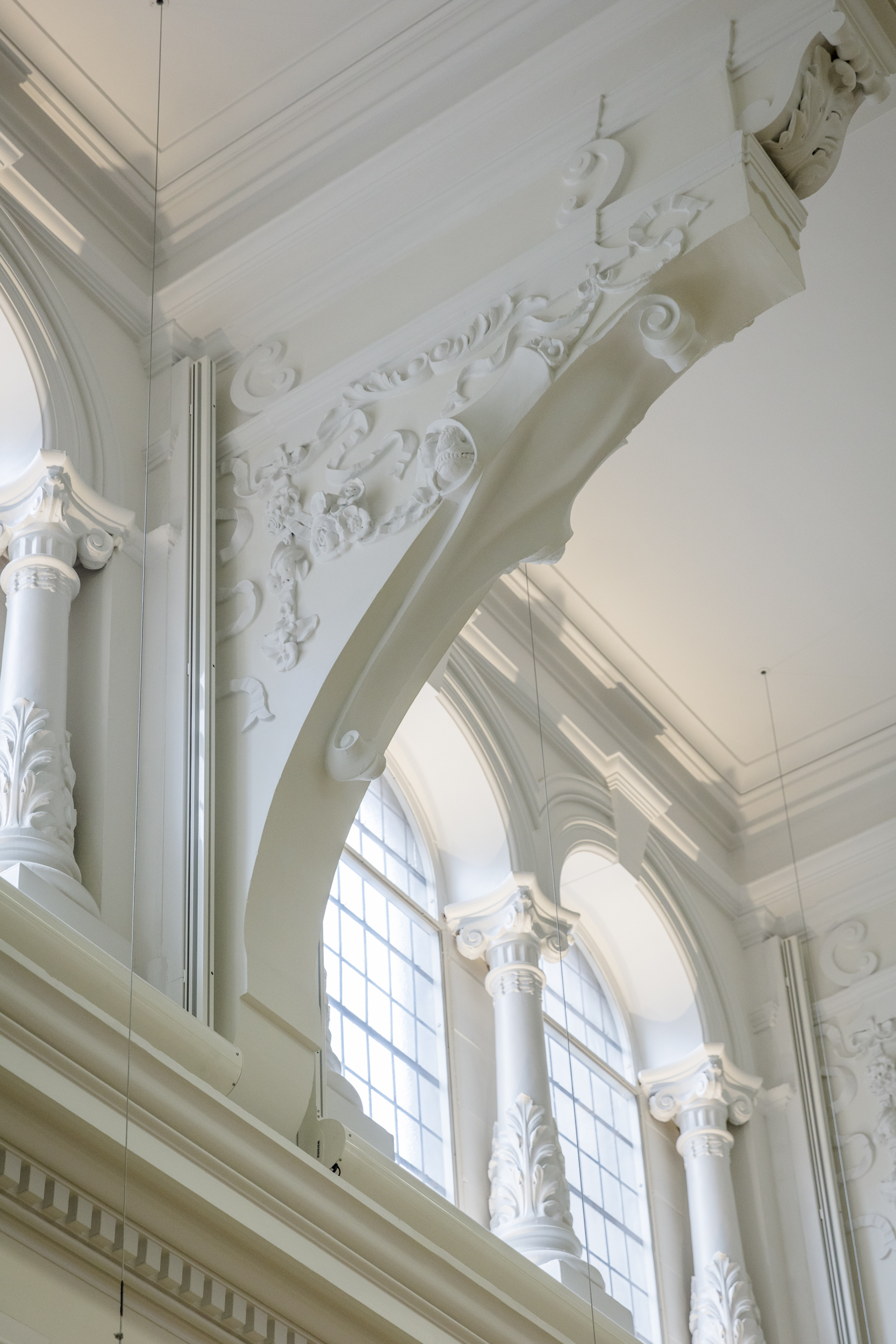 Great Hall at Bishopsgate Institute with ornate moldings, ideal for events and workshops.