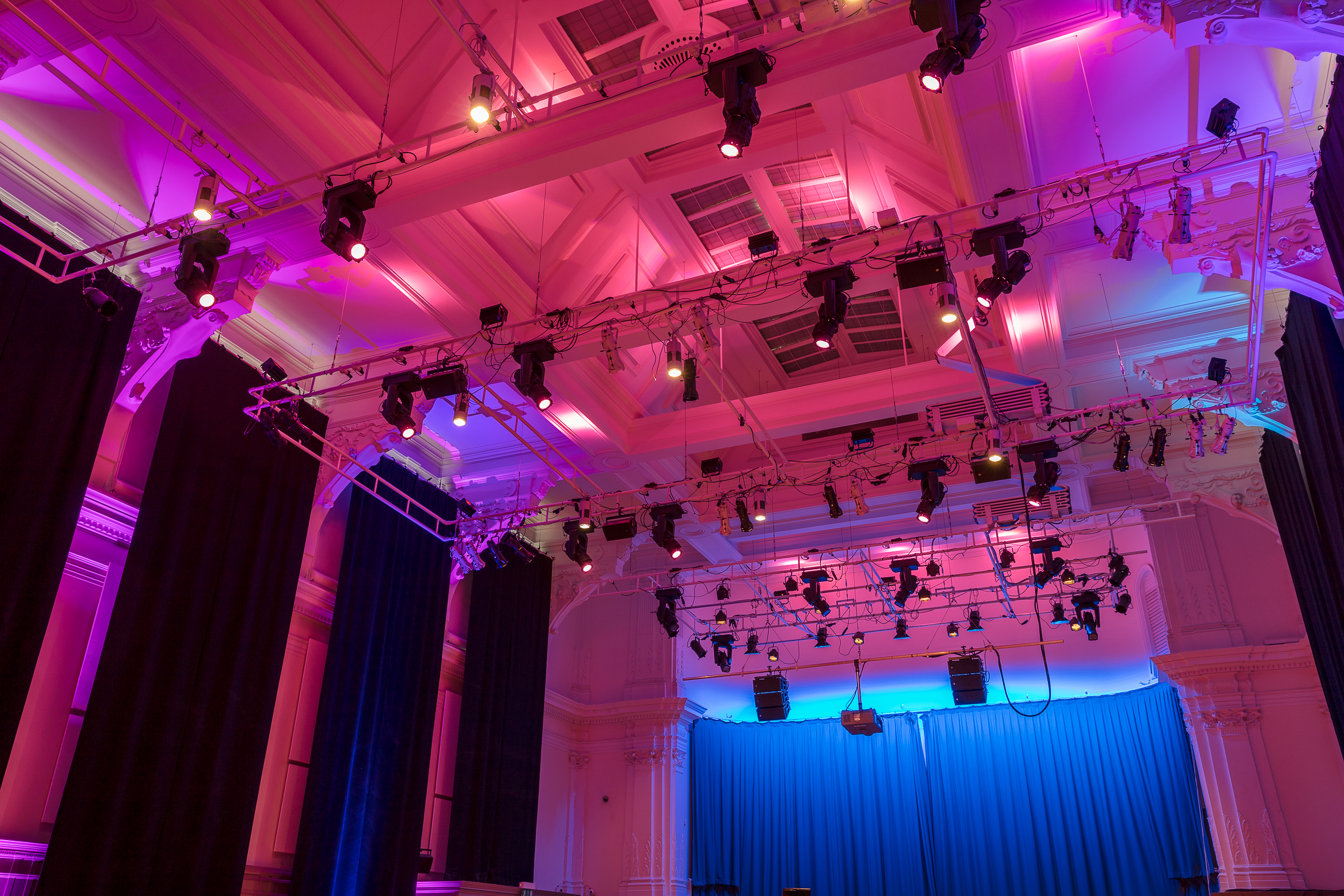 Great Hall at Bishopsgate Institute with vibrant lighting for events and conferences.