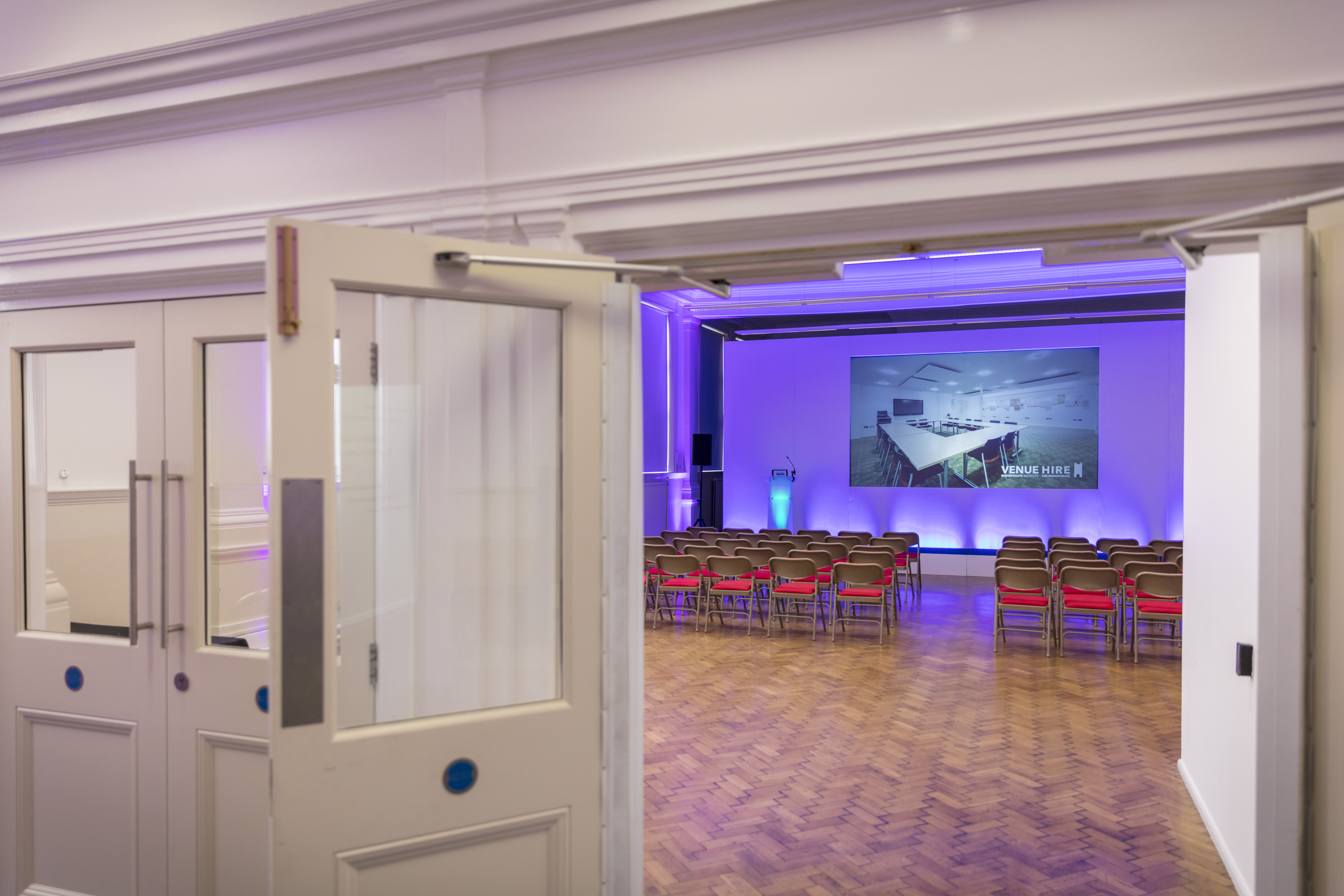 Upper Hall at Bishopsgate Institute, modern event space for presentations and workshops.