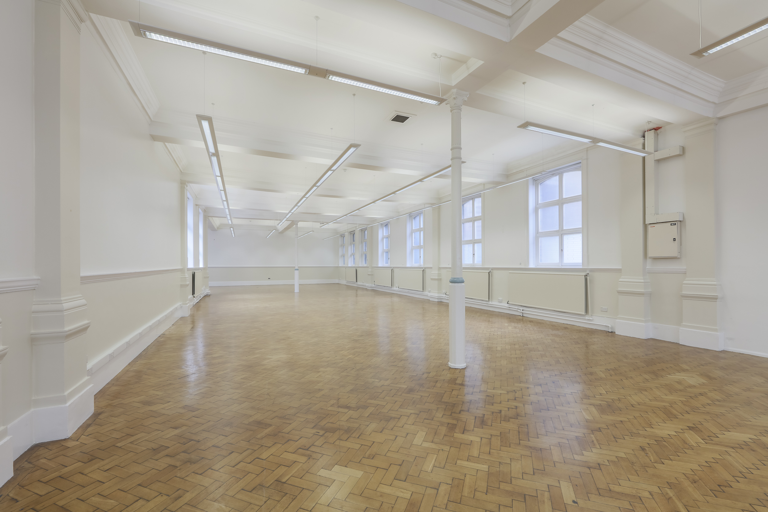 Spacious Upper Hall at Bishopsgate Institute, perfect for meetings and workshops.