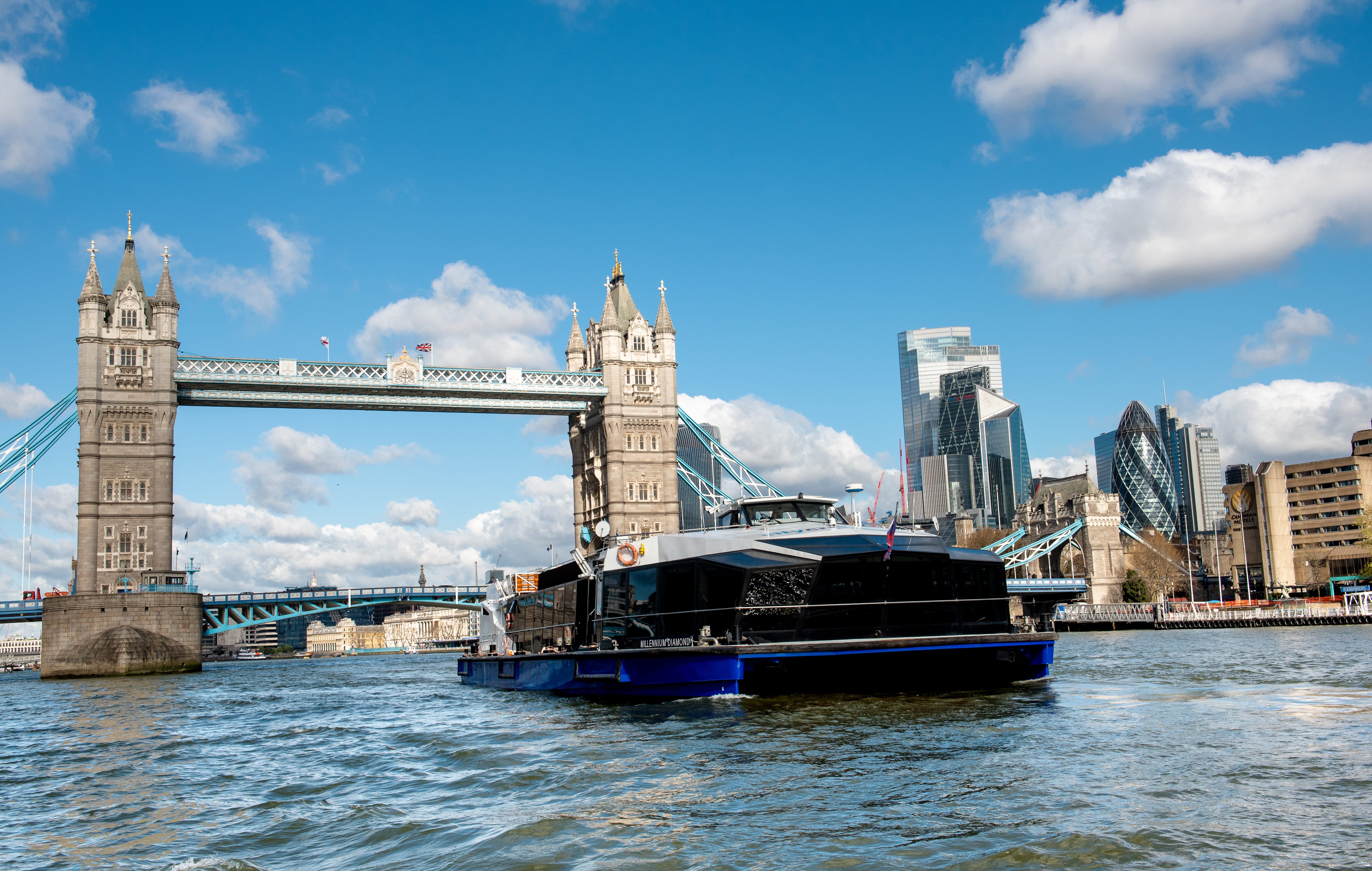MV Millennium Diamond boat with Tower Bridge, perfect for corporate events and private gatherings.