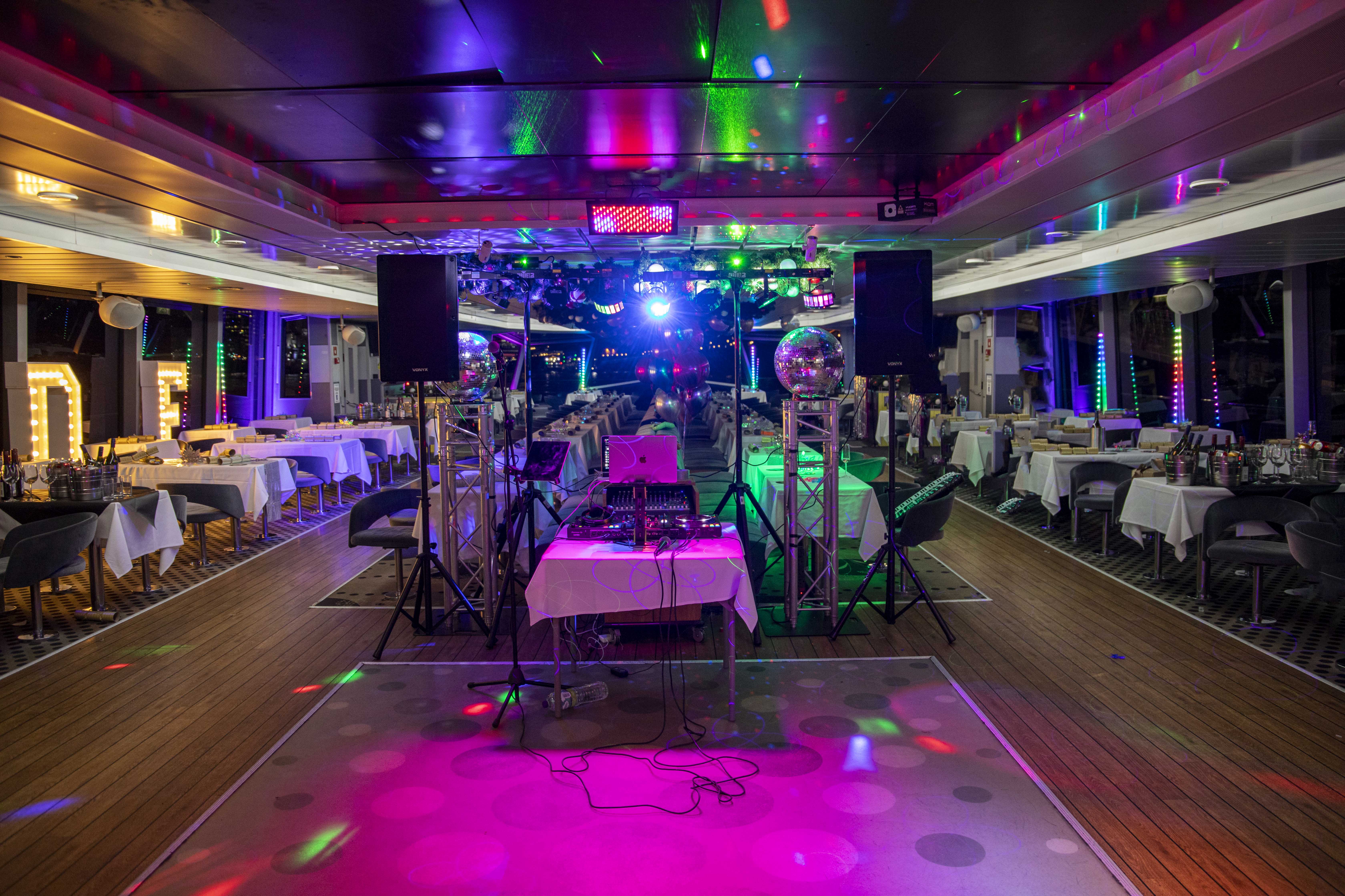 MV Millennium Diamond event space with vibrant lighting for lively parties and celebrations.