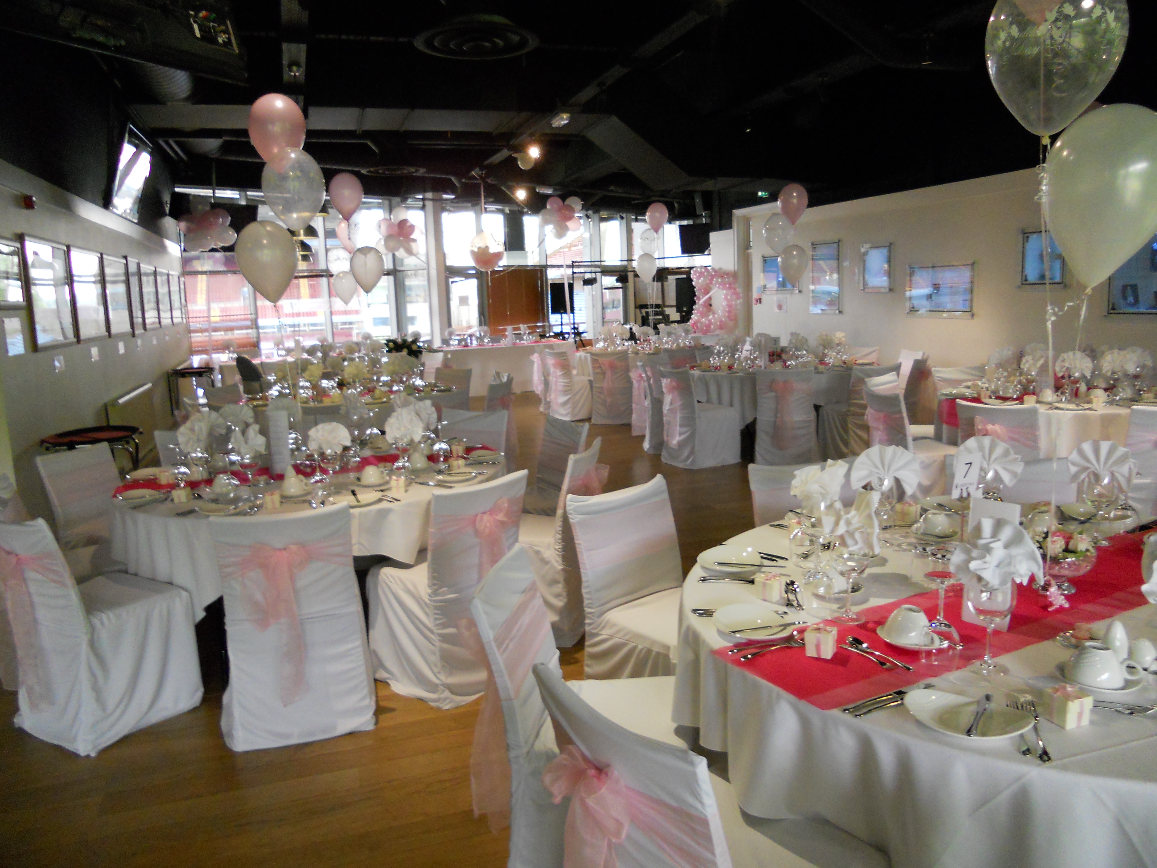 Elegant wedding venue at McGregors, Villa Park with white linens and pink accents.