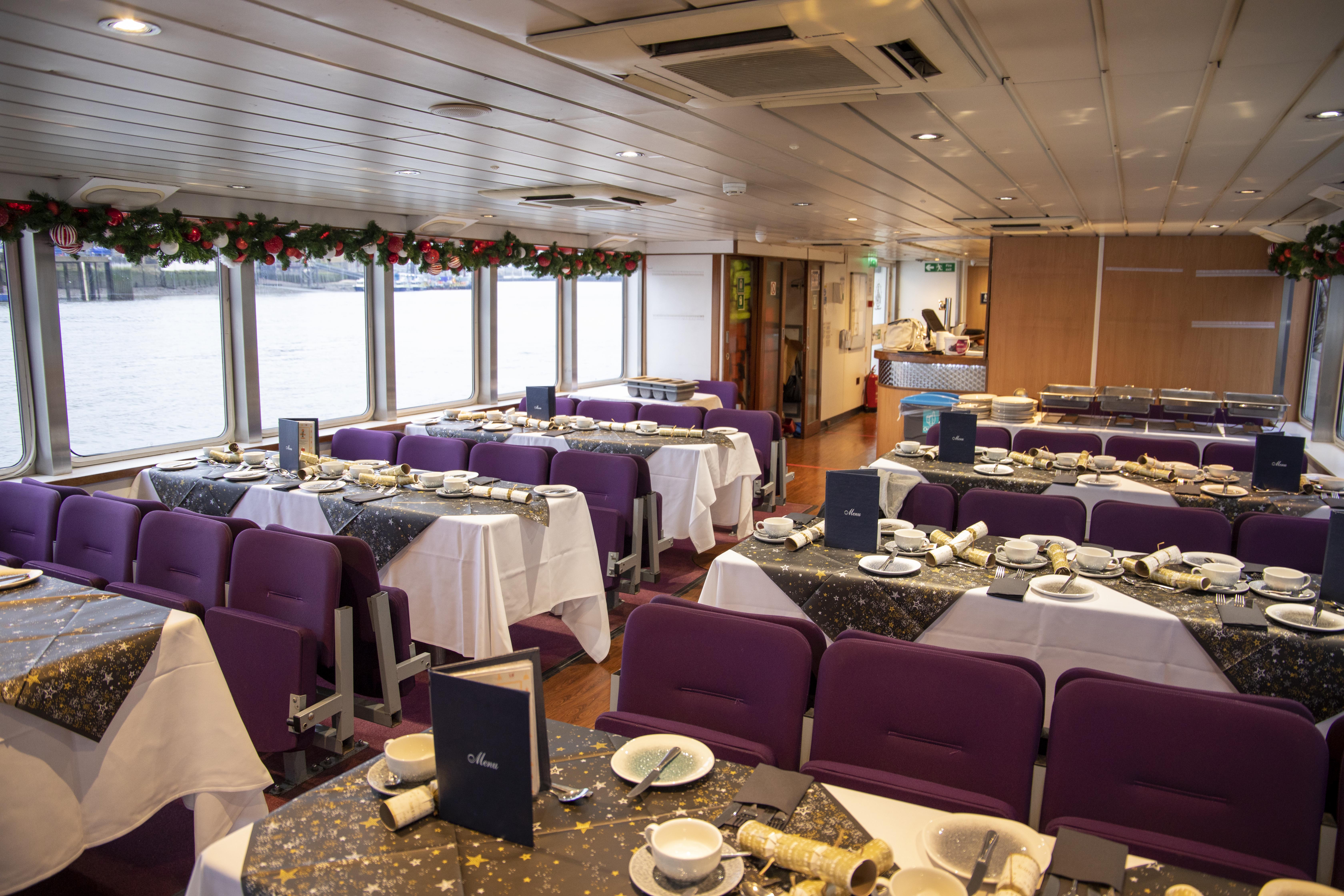 MV Mayflower Garden event space with elegant purple seating for corporate gatherings.