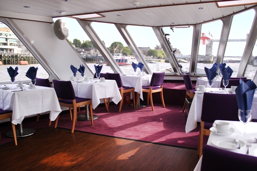 Elegant dining setup on MV Mayflower Garden for corporate events and private celebrations.