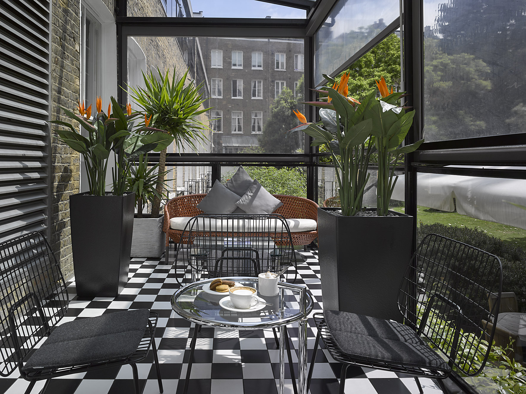 Indoor garden venue at K+K Hotel George for meetings and networking events.