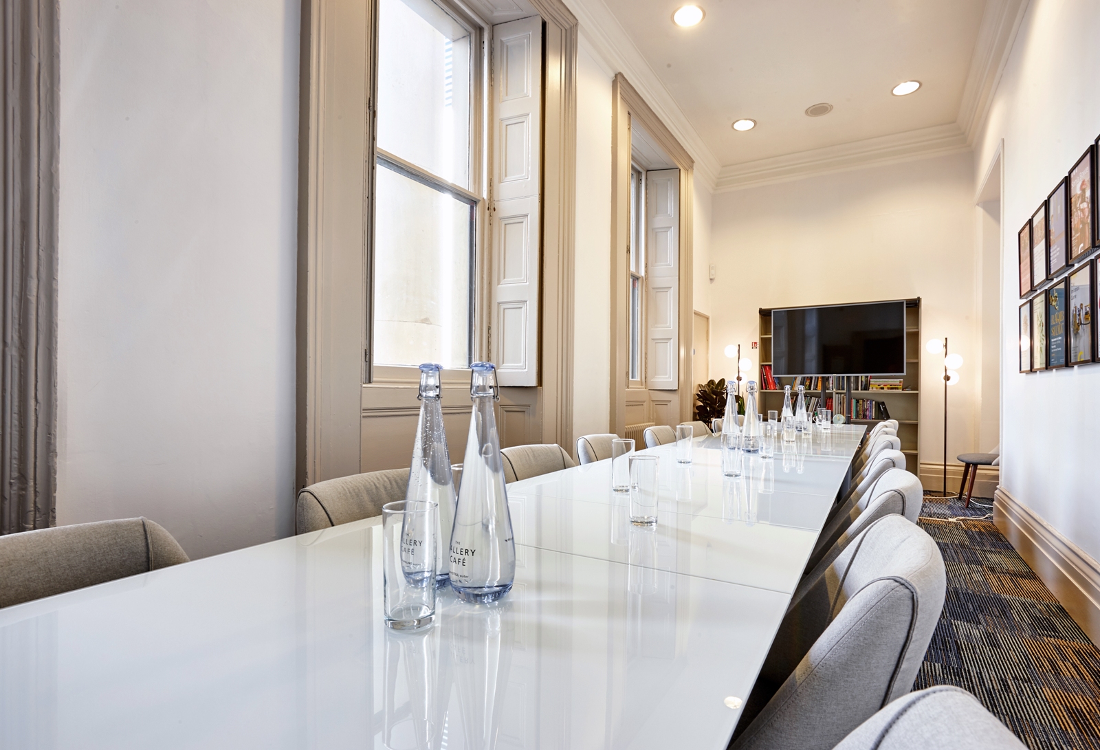 Modern conference room with glass table, ideal for corporate meetings in Manchester Art Gallery.
