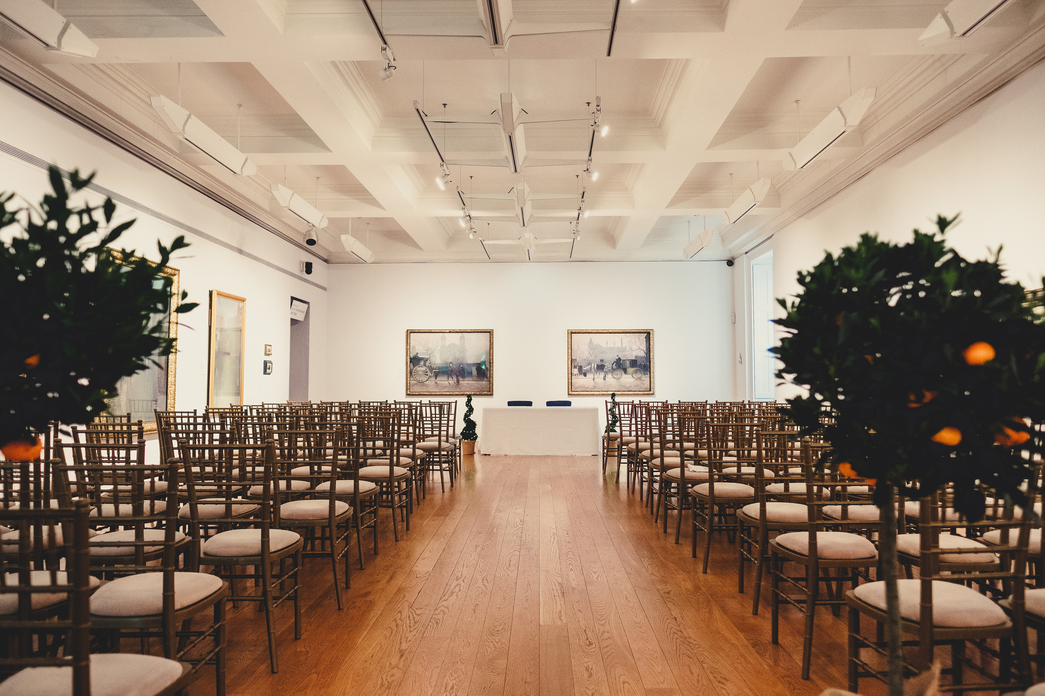 Elegant event space with gold chiavari chairs for meetings and celebrations in Manchester.