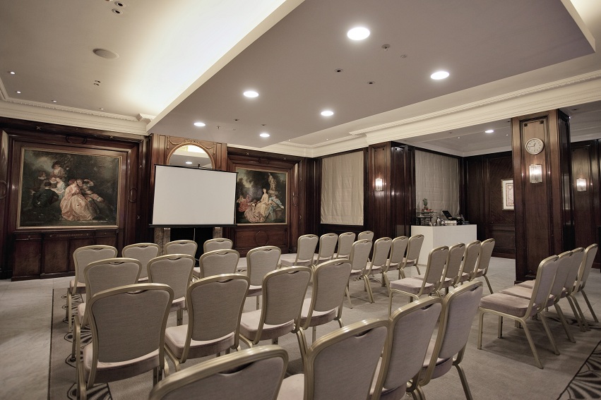 Executive Boardroom at The Waldorf Hilton, London - elegant wood paneling, ideal for meetings.