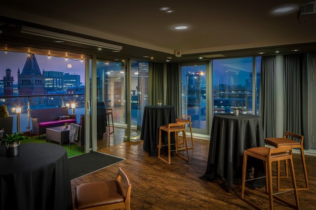 Sky Lounge at DoubleTree Manchester, modern decor, ideal for networking events and receptions.