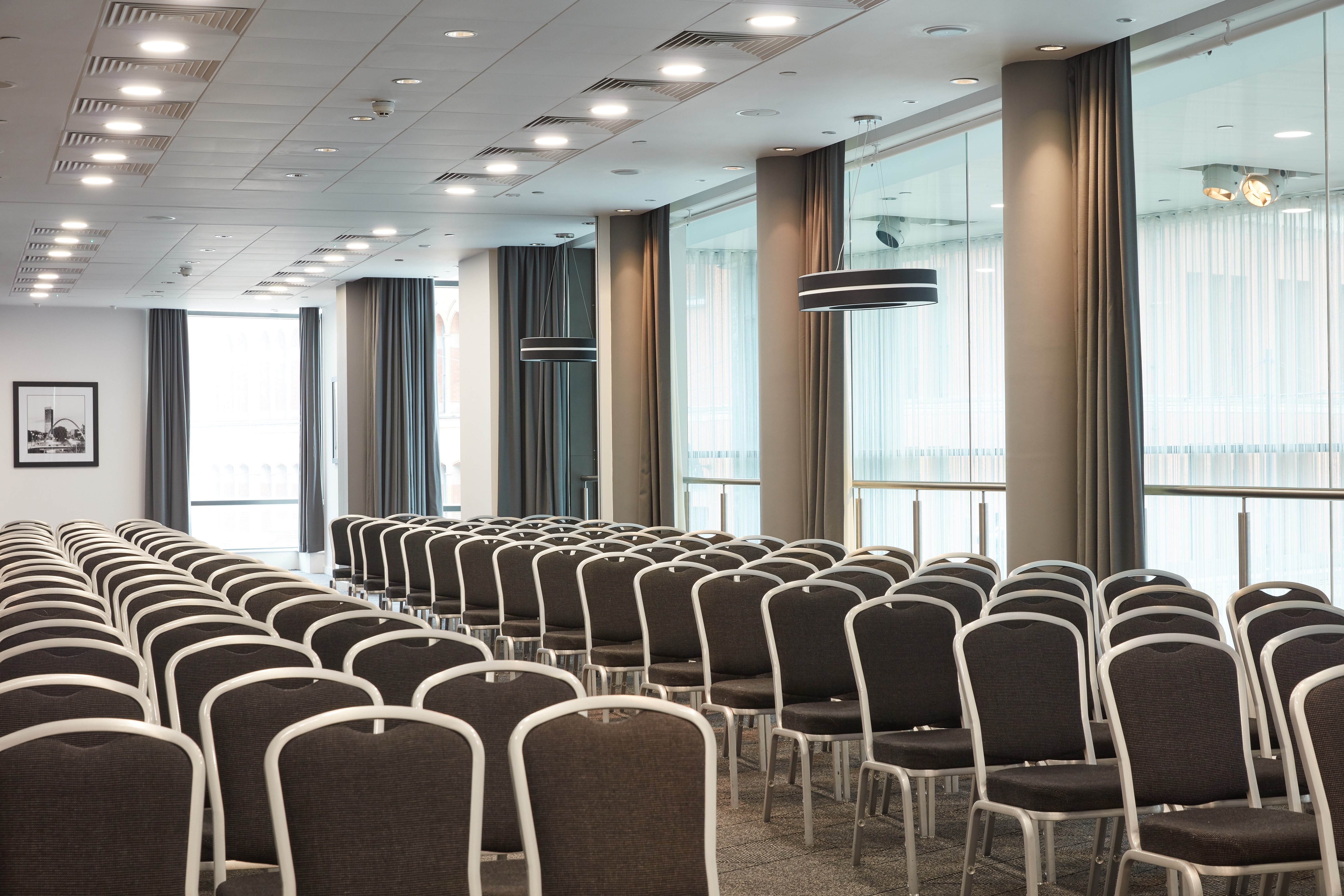 Event space at DoubleTree by Hilton Manchester with modern design and ample seating.