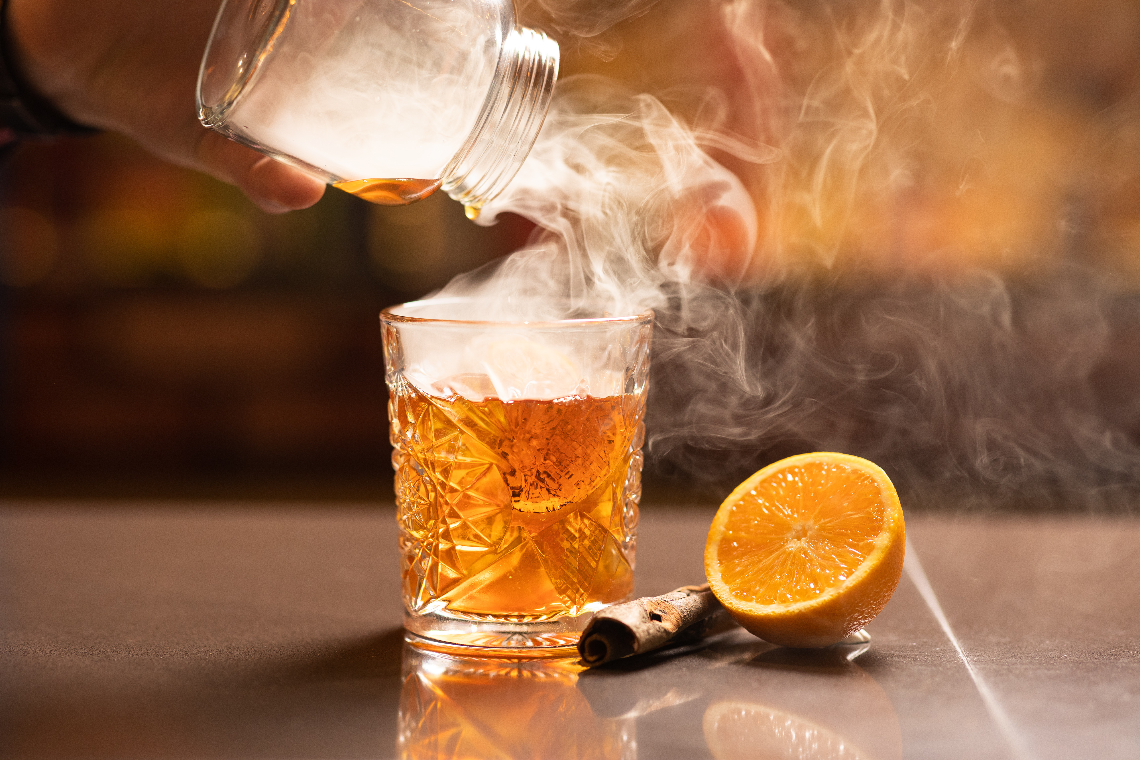 Cocktail preparation at Store Street Exchange, perfect for winter events and holiday parties.