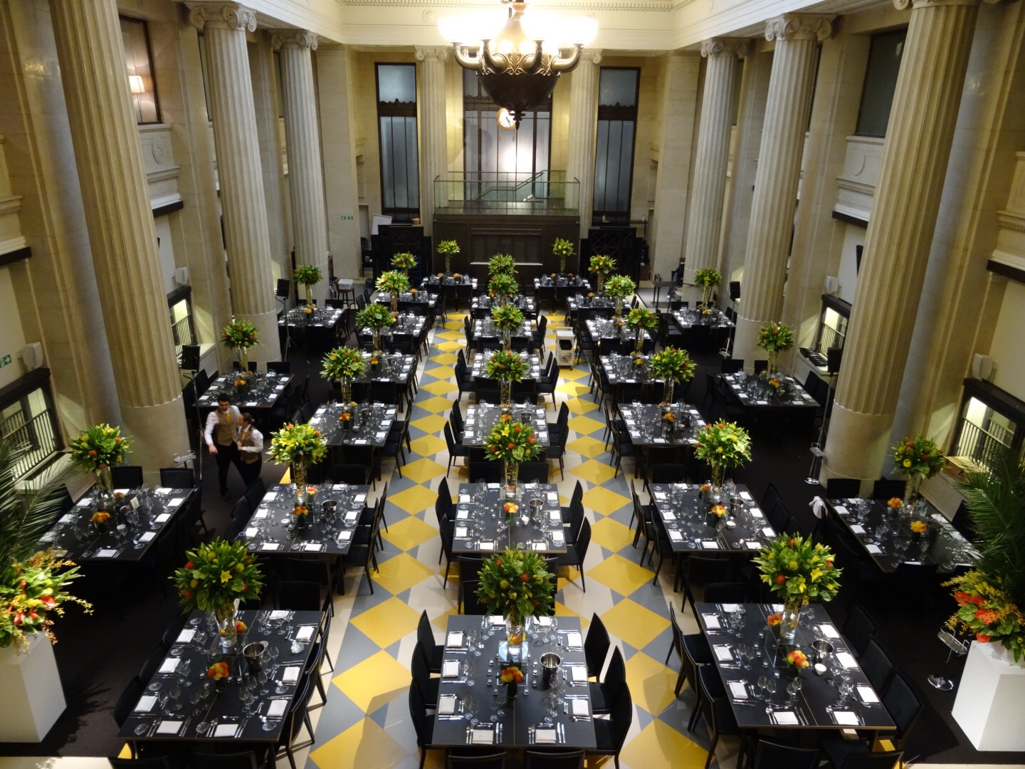 Elegant banquet hall with floral centerpieces for upscale events and corporate functions.