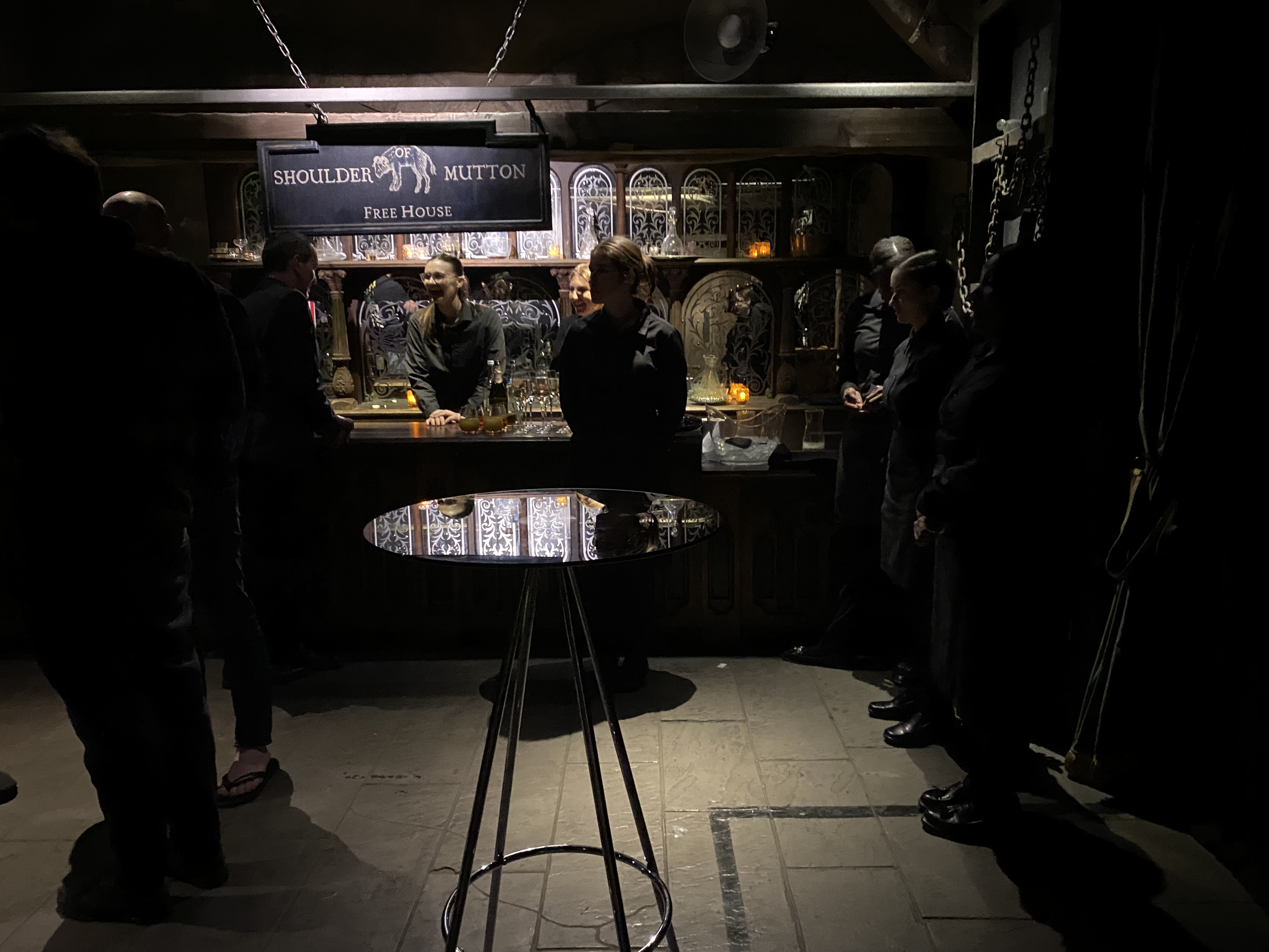 Stylish dimly lit bar at The Tavern, ideal for upscale networking events in London.