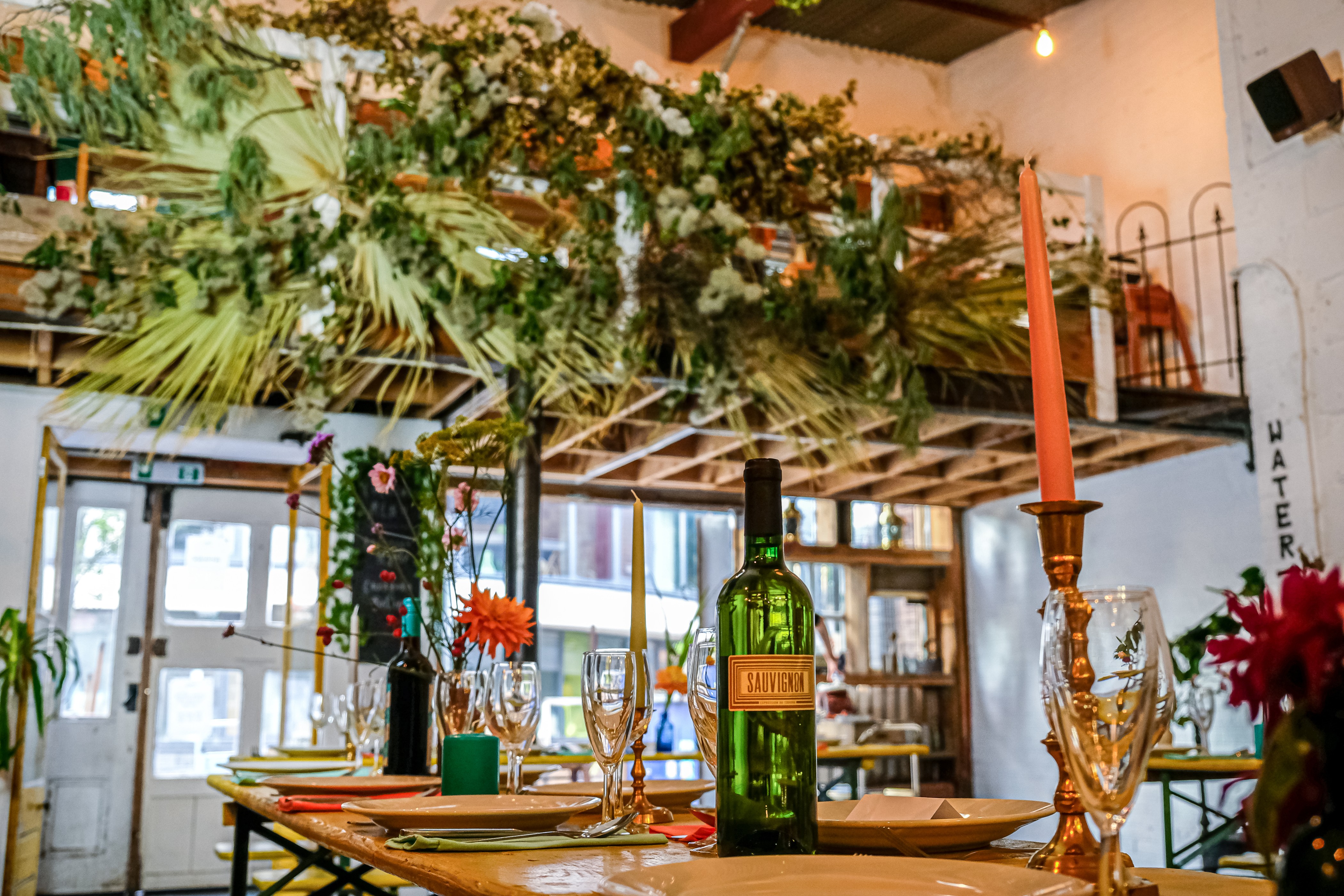 Homerton Venue event space with floral decor and elegant table settings for gatherings.