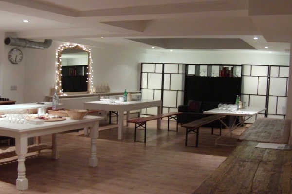 Versatile event space in White Hart Wine Room, ideal for dining and networking.