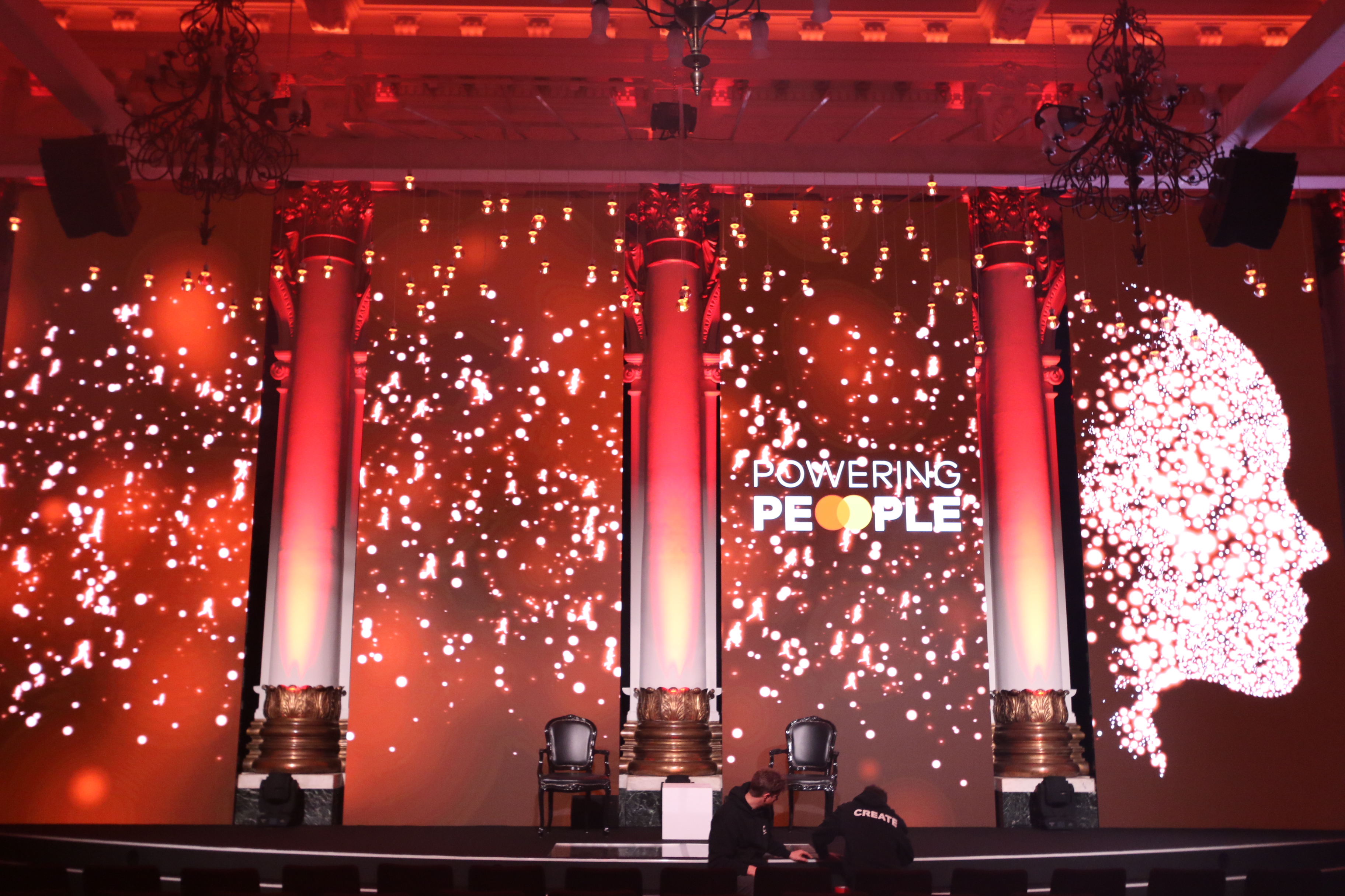 Dynamic event stage at The Ballroom, vibrant backdrop for impactful presentations.