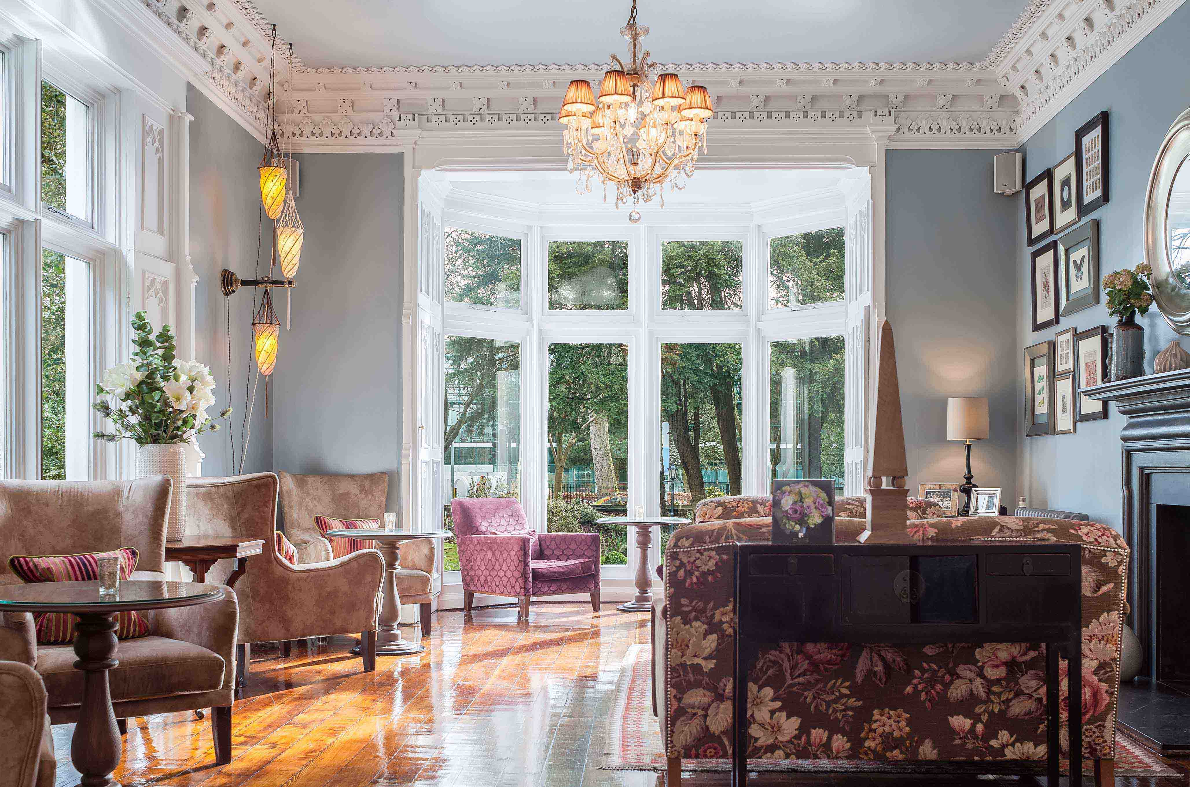 Sophisticated Blue Lounge at Didsbury House Hotel, ideal for networking events.