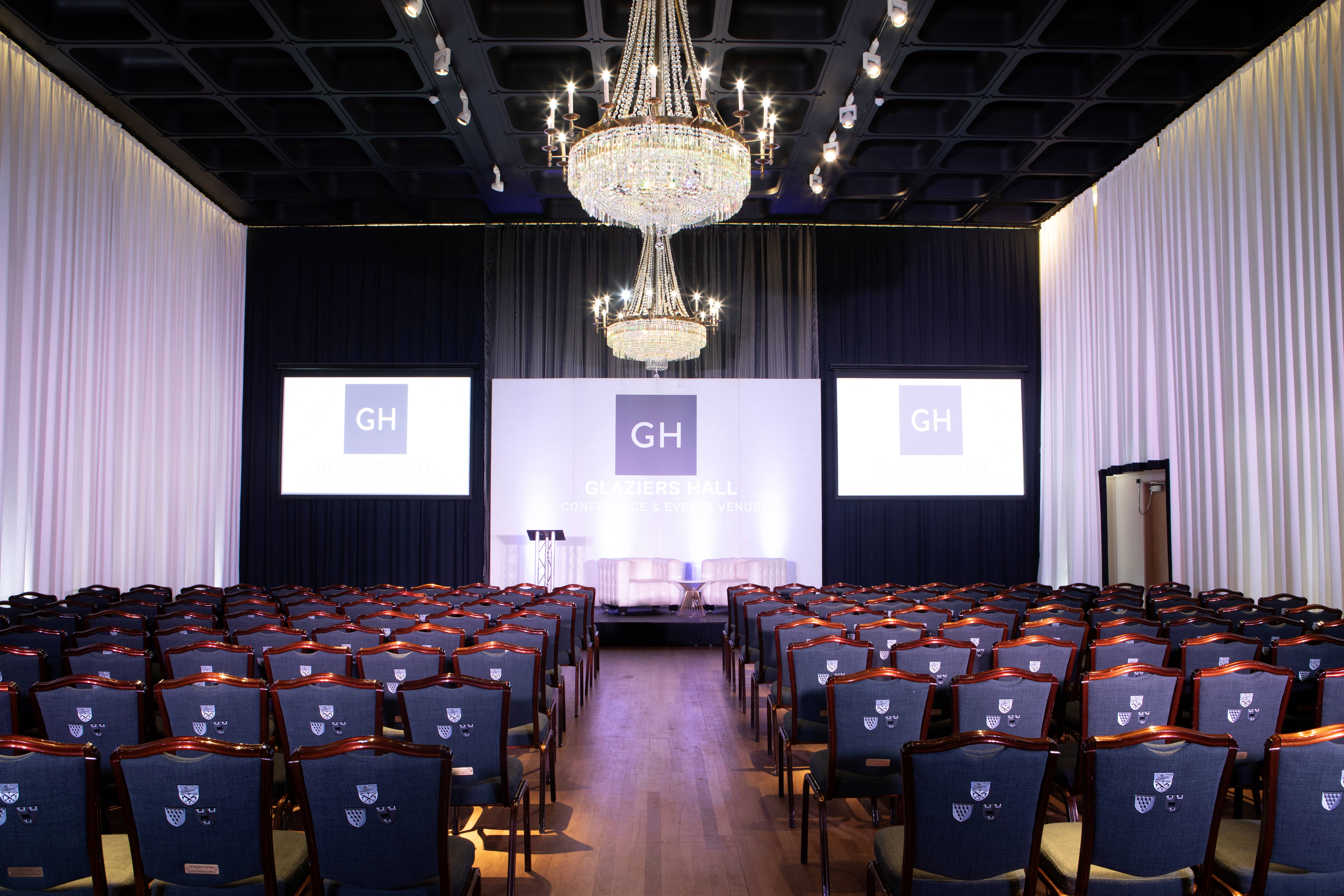 Elegant Banqueting Hall with chandeliers, perfect for corporate conferences and seminars.