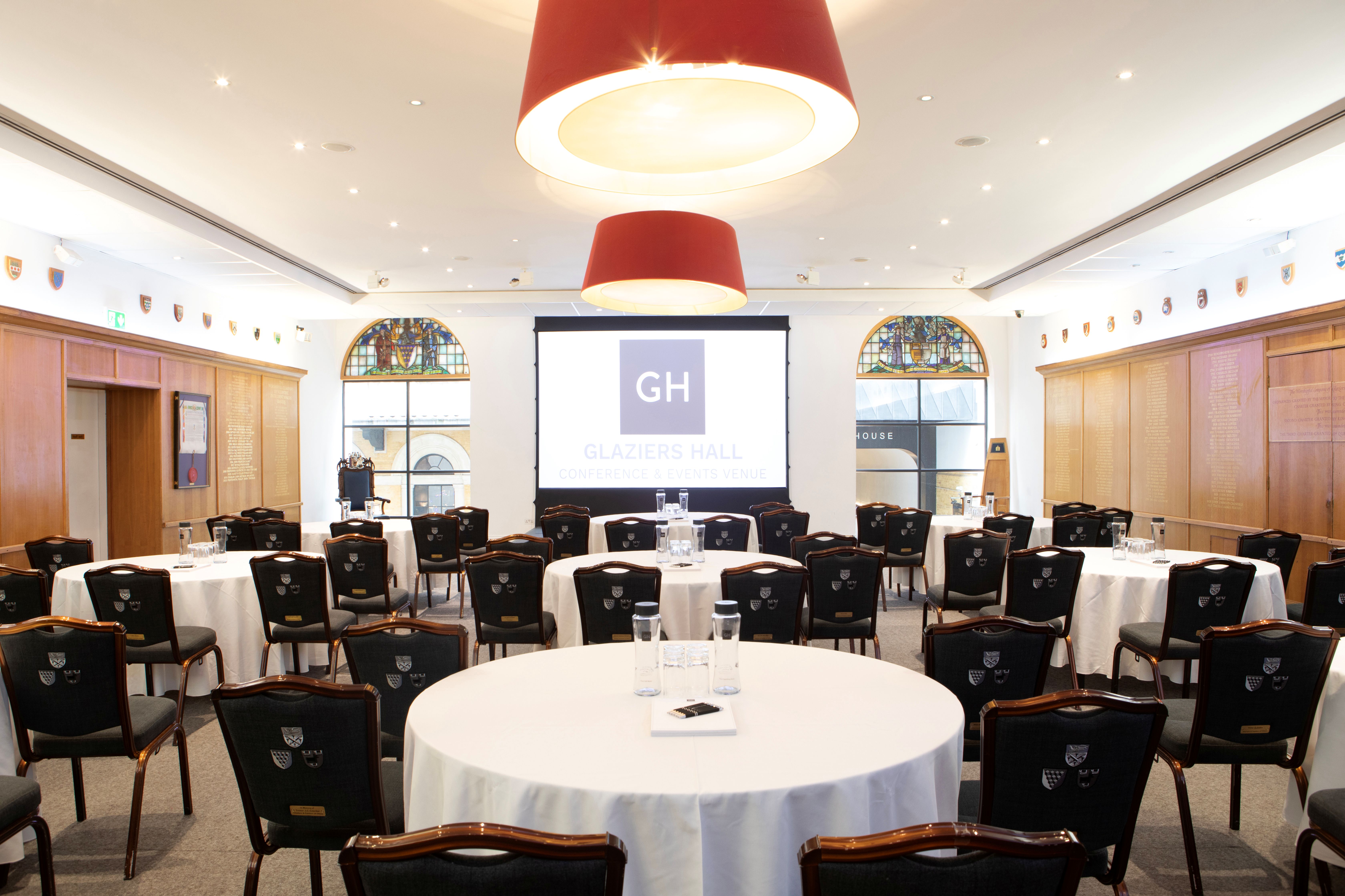 Court Room and Library at Glaziers Hall, featuring round tables for corporate events.