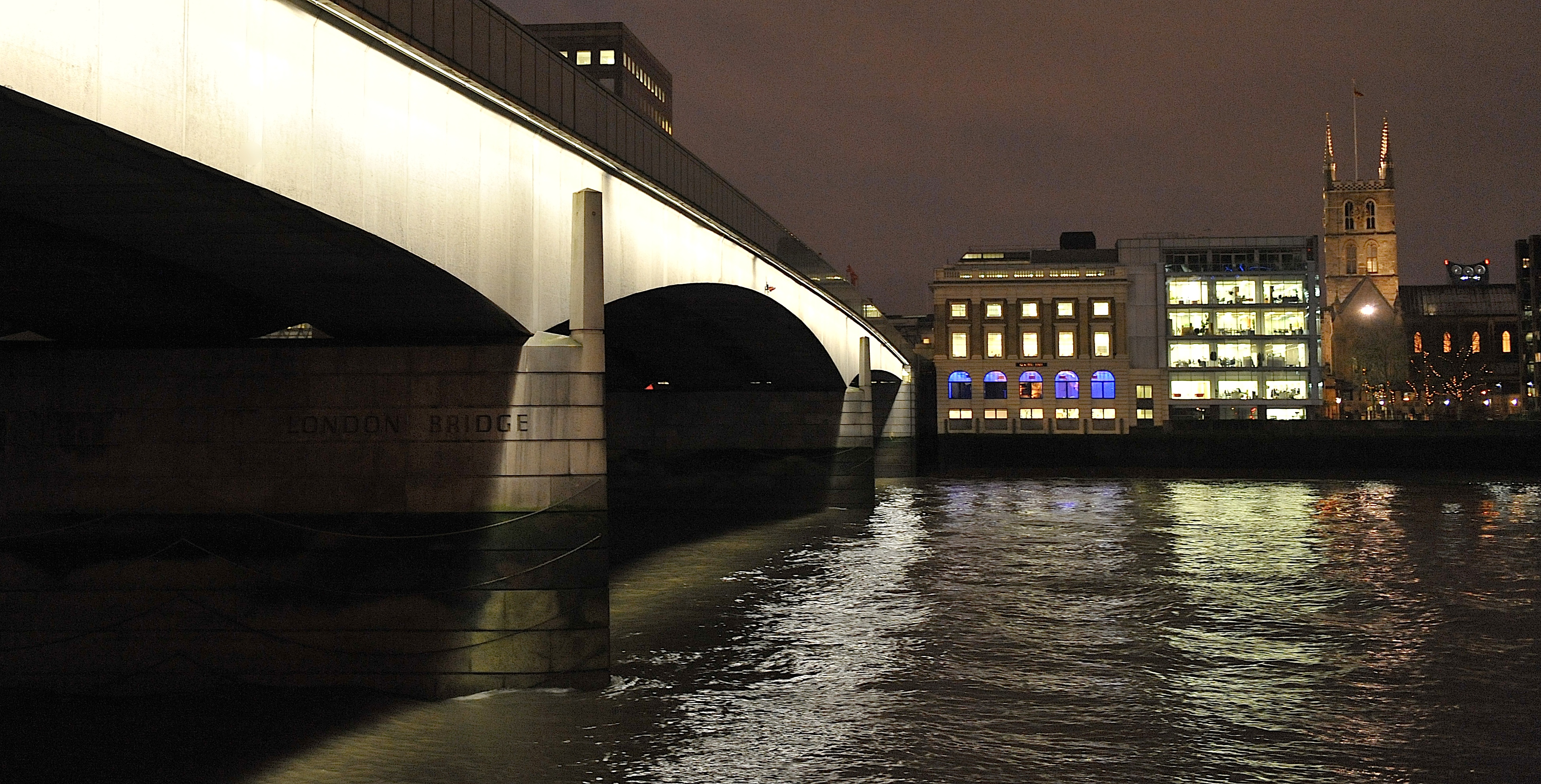 Illuminated bridge at night in The River Room, perfect for elegant evening receptions.