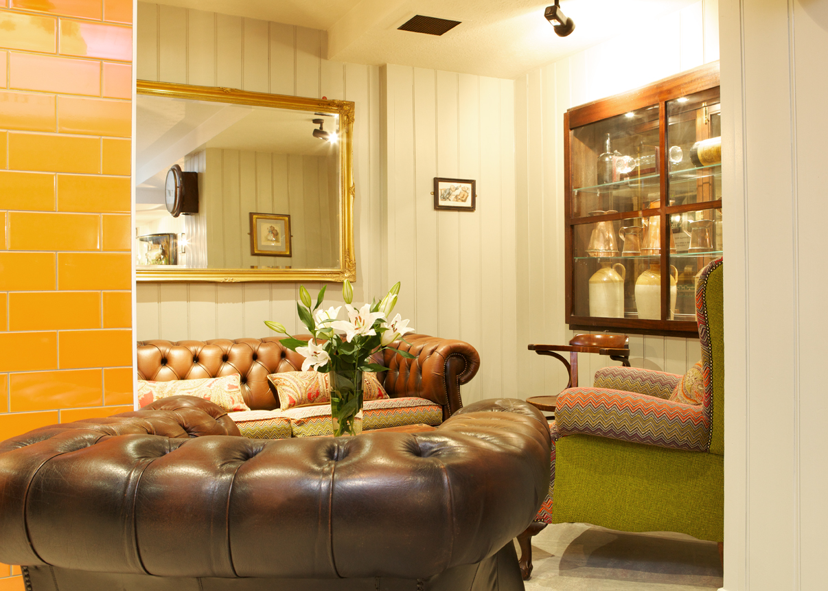 Cozy dining area in Bangers Bar and Grill, perfect for informal meetings and networking.