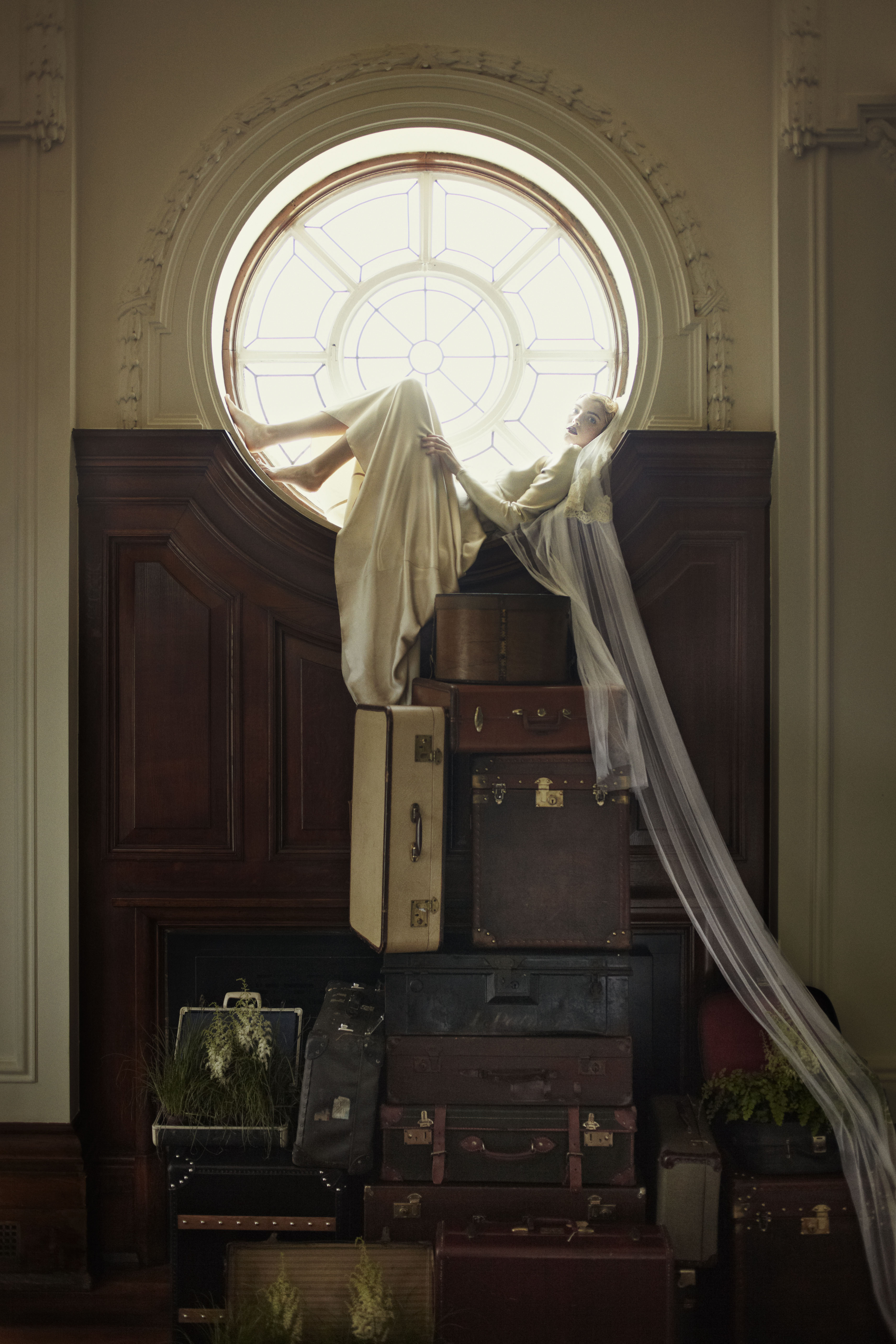 De Montfort Suite with vintage suitcases for creative event design and storytelling.