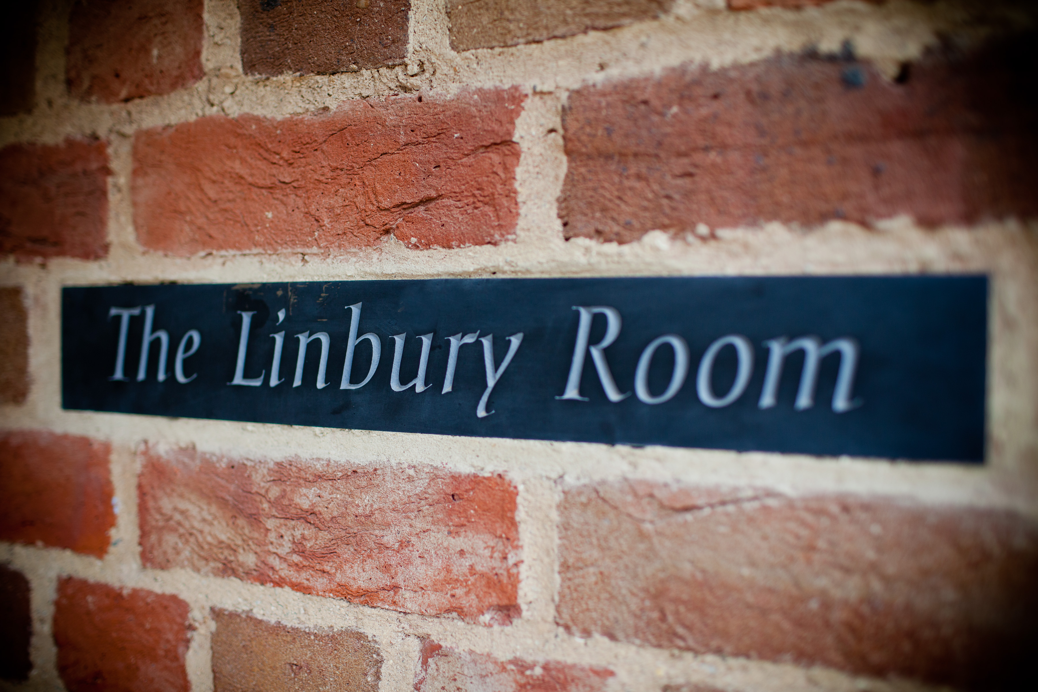 The Linbury Room at Dulwich Picture Gallery, rustic brick venue for events and meetings.