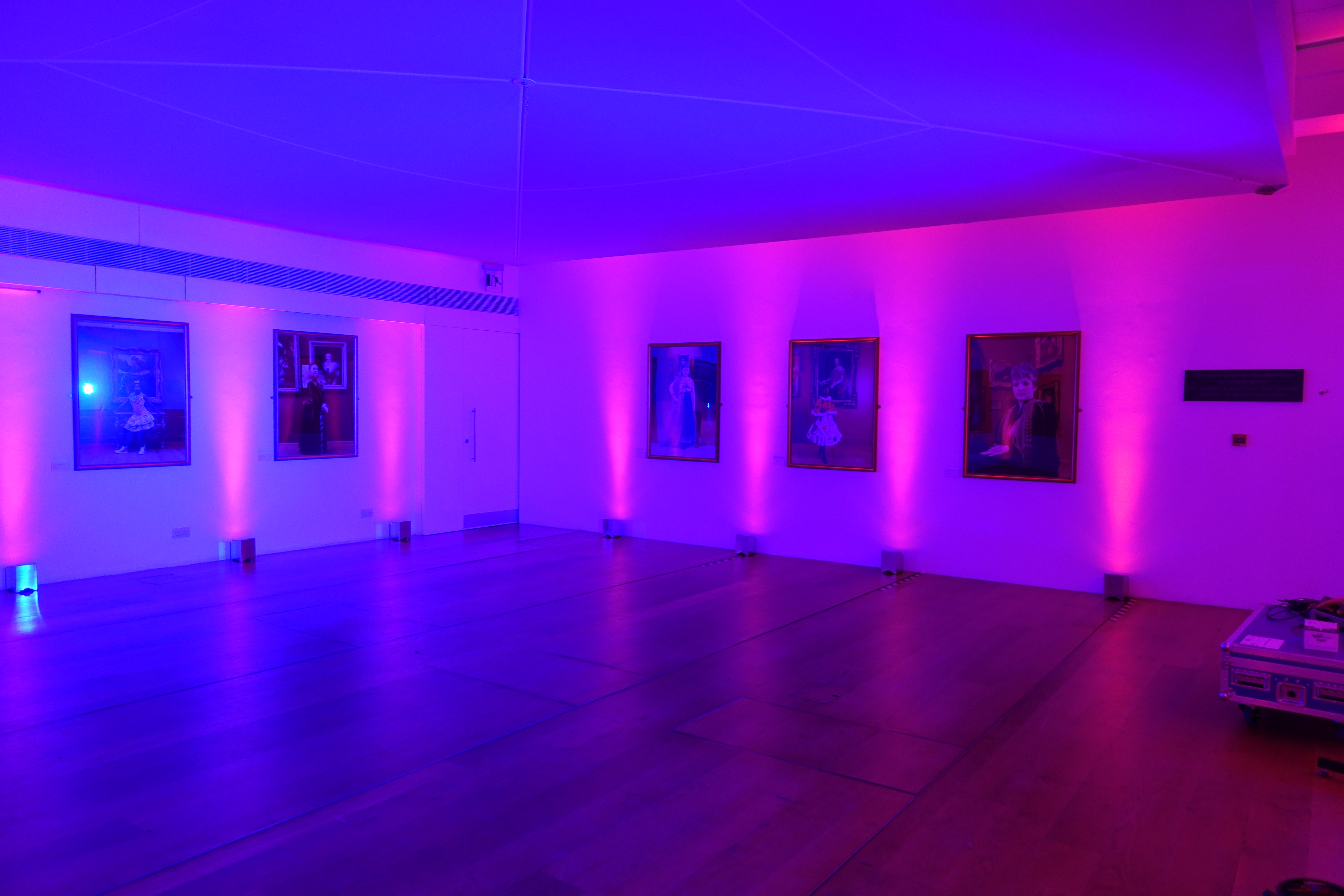 Stylish Linbury Room with purple lighting, ideal for upscale events and art exhibitions.