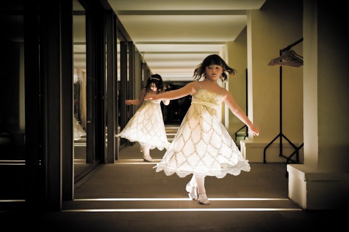 "Whimsical children in elegant dresses at Gallery Cafe, perfect for weddings and celebrations."