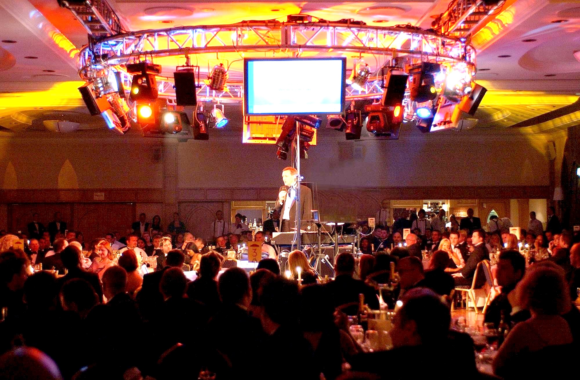 Vibrant Alton Towers stateroom with stage, ideal for corporate events and gala dinners.