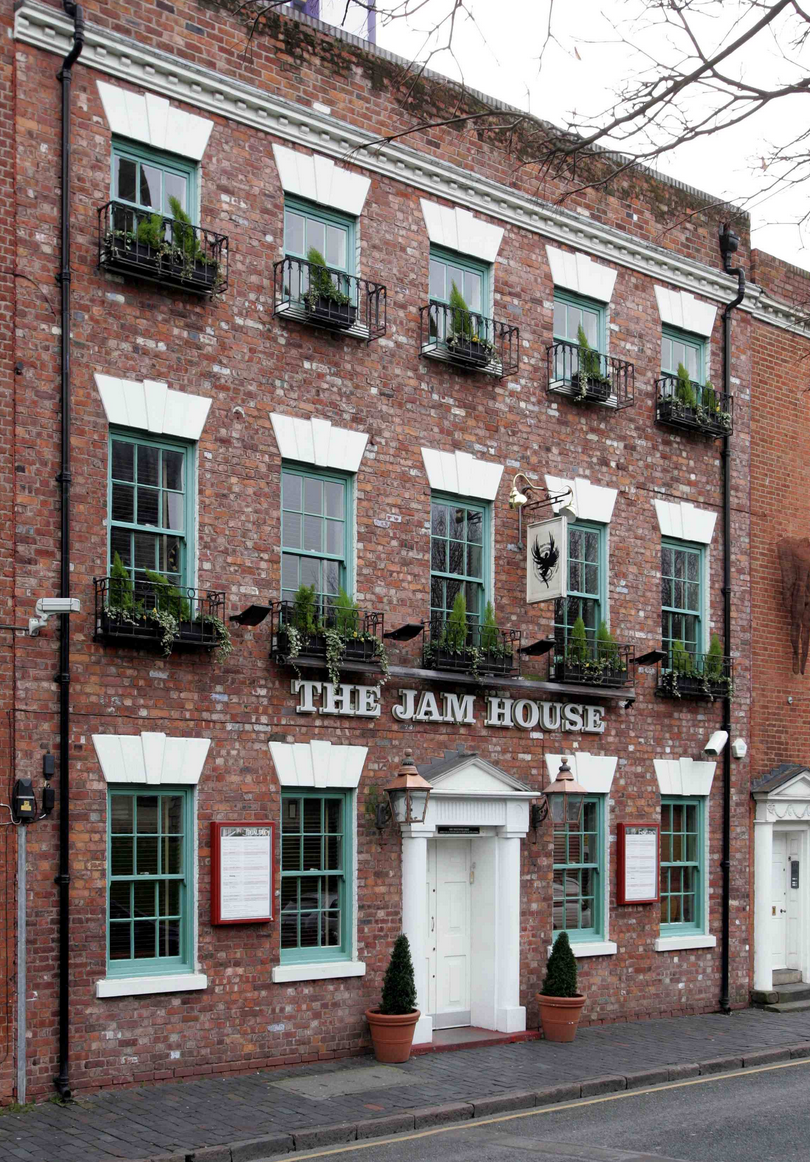 Charming brick venue, The Jam House, perfect for intimate gatherings and events.